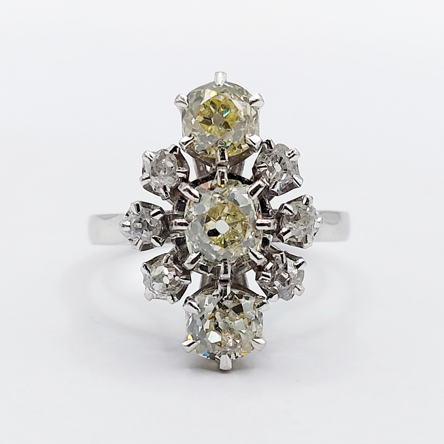French Art Deco marquise ring 18k white gold set with 1.50 carats of old mine cut yellow diamonds flanked by 0.30 carats of old mine cut white diamonds (circa 1930)
PRICE : 1750€
Magnificent French goldsmith work
Size: 51 FR / 5.5 US
Weight: 5.08 g
Main diamond size: approximately 5.8 x 4.9 x 3.5 mm (estimated at 0.70 carats)
Secondary diamond size(x2): approximately 4.8 x 3.5 mm (estimated at 0.40 carats each)
Diamonds in very good condition (only one micro-scratch visible under a magnifying glass), yellow in color, with a few tiny inclusions visible under a magnifying glass
White diamond size(x6): 2.5 to 3 mm (estimated at 0.30 carats in total)
Head size: 18.9 x 13.1 mm
Micro scratches from use
Eagle's head hallmark and Master Goldsmith's hallmark from WEGELIN in Lyon (French Hallmarks)
#frenchjewelry #diamond #diamondring #antiquering #victorian #victorianring #marquisering #augustusjewels #vintagering #daisyring #daimondhaloring #tragetring #oldminecut #oldminecutdiamond