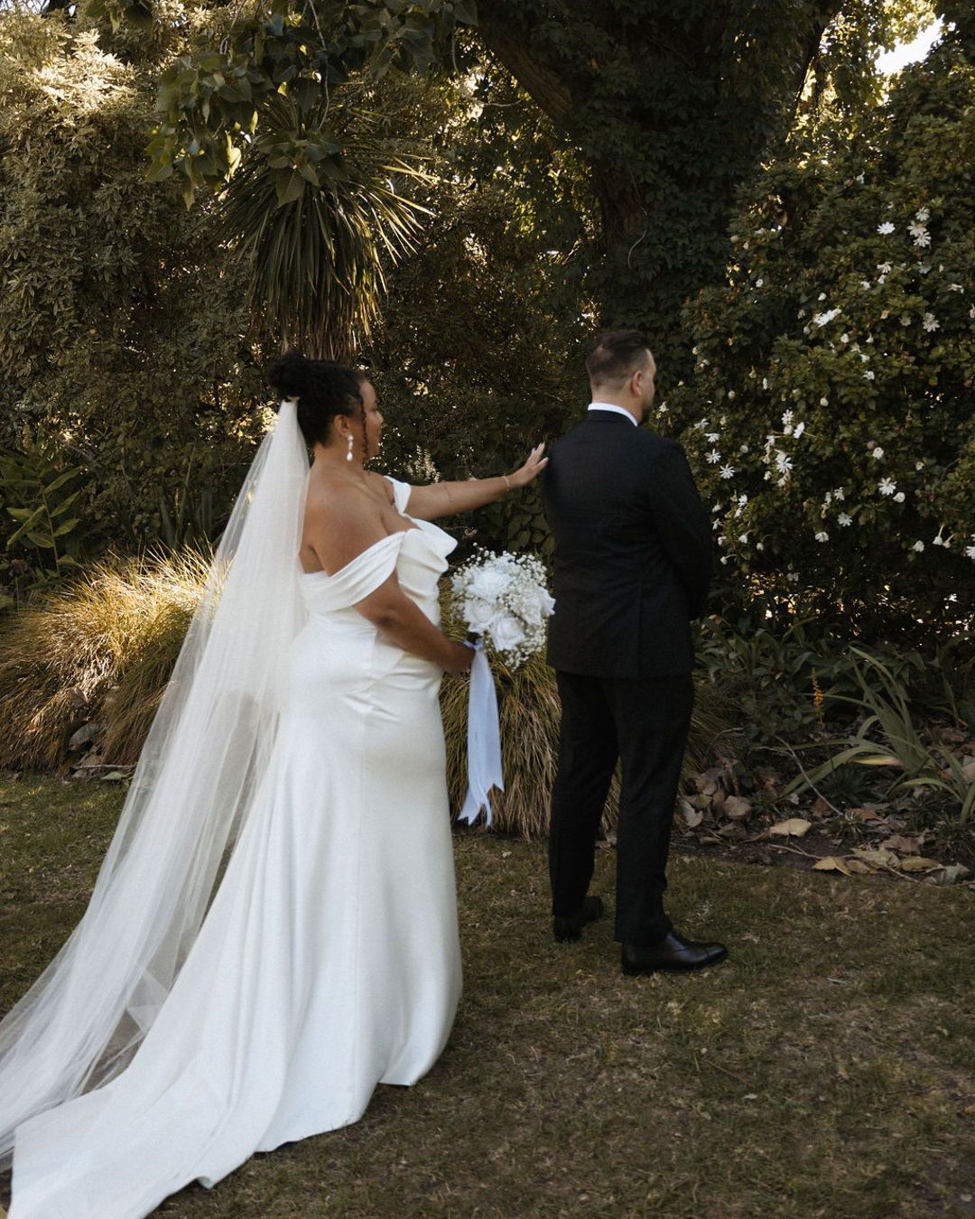 First looks.... No audience. No pressure.
Just you two, soaking each other in.
The joy. The nerves. The giddy excitement forever.
Need an example? Look no further than Elliott's face the moment he sees stunning Savannah.
Your wedding days move fast, and a first look gives you space to breathe, chat, cry, hug, maybe even sneak in a cheeky kiss.
And yet, seeing your partner at the end of the aisle still hits so hard. A first look doesn’t spoil the magic; it only adds to it.
I say go for it. But like everything in your wedding, make it yours. Your day, your way. Always. 💛
Photographer @emilyrose.photographer_
Venue @gardenshouseag @atlanticgroup
Content Creator @_scenebehind
Florist @onefinedaisy_
Celebrant @celebrant_jorgiabrown
Makeup @elliezukermakeup
Gown & Veil @kwhbridal
#FirstLook #MelbourneCelebrant #WeddingTips #marriagecelebrant