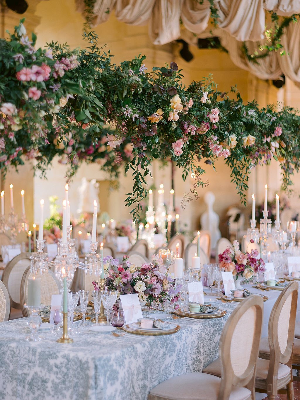 We never tire of florals like these. A poetic palette for Danae & Ian, brought to life so beautifully by @botaniquebazar at @chateaudevallery.
“Interestingly enough, during our first call, Danae and Ian never mentioned it outright, but from what they described, I just knew. And when we met again to go over the proposal I had sent them, I said ‘So I’m only going to say this once, but we’re basically going for a Bridgerton-style theme, right?’ ‘Yes! That’s exactly it!’
That’s when I knew we’d hit it off. Working with Danae and Ian was truly a dream. Such trust and creative freedom is really enjoyable when working on projects of this scale.
This is also when I discovered how comfortable it was to work with Pauline from @botaniquebazar, as we have a very similar thought process. Surrounding yourselves with the best of the best when planning your wedding makes a world of difference.
So many lovely projects in the works—I can’t wait to share more with you soon.”
-Célia
Venue: @chateaudevallery
Photo: @gregfinck
Video: @zenfilmworks
Planning, design and production: @bonjourweddings.fr
Assistant coordinators: @charlotte_adt @joelleantounevents
Wedding dress: @eseazenabor
Pre and post wedding dresses: @rimearodaky
Groom’s attire: @dior @louboutinworld
Florals: @botaniquebazar
Paper goods: @emilybairddesign
Hair: @ciaracoiffure
Makeup: @beautybymaeva
Catering: @domainedesjardins
Cake: @syniesparis
Couscous: @l.oasis.orientale.paris
Officiant: @theparisofficiant
Live music: @ivana.string.quartet
DJ: @selecktive.official
Live painter: @eventillustrator
Rentals: @atawaevent @maison_options @velvetrendezvous
Technics and production: @bounz.events
Content creation: @goldy.house
Aerialist: @cara.chapman.aerial
Fire show: @supercho_show
Fireworks: @cduval77890
🤍✨ @drnaenae @advnturecaptlst ✨🤍