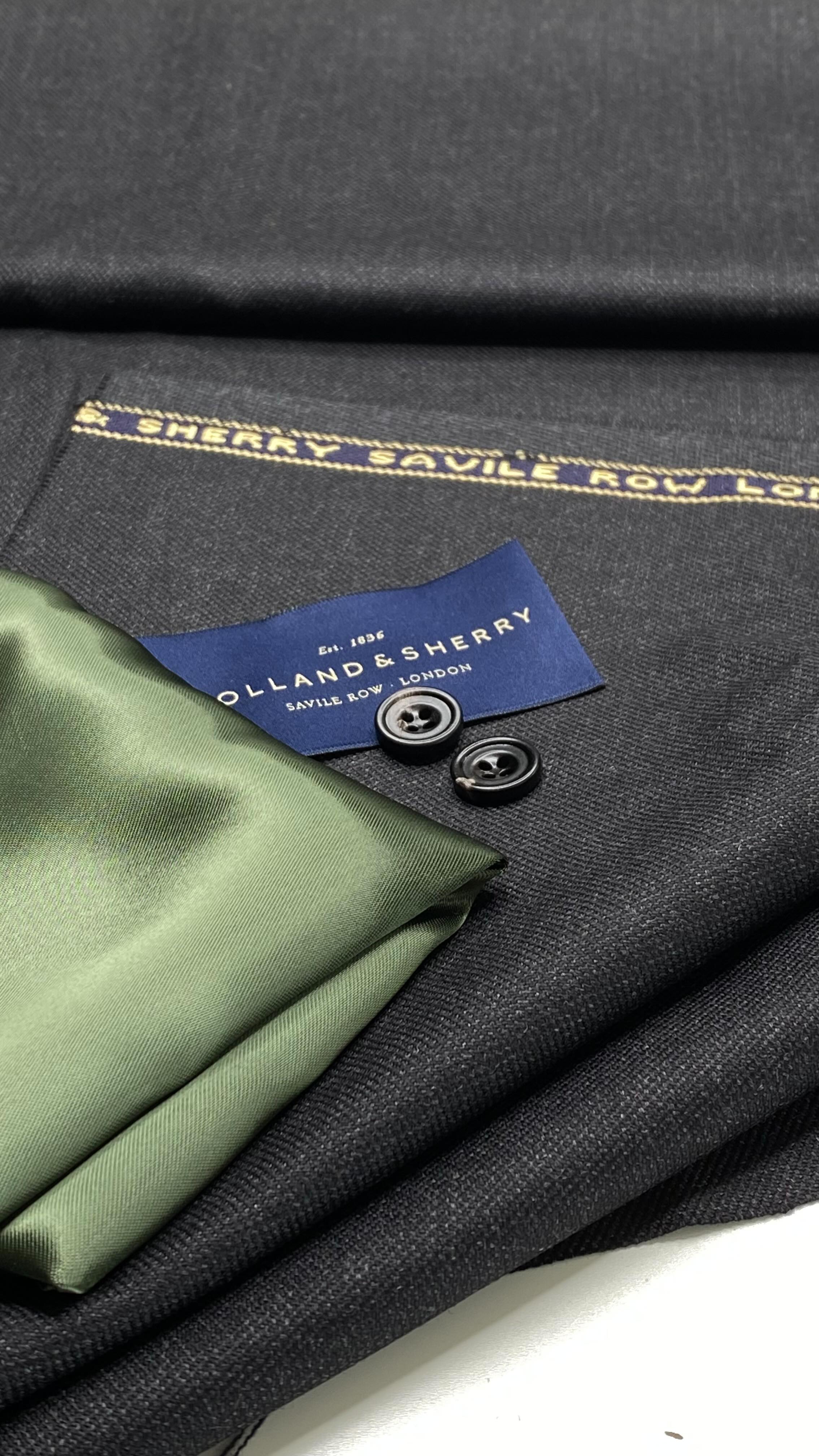 We may be basking in the heatwave this week and are not quite ready to stop enjoying al fresco dinners just yet, but some people are already planning their winter office wardrobe!
The latest commission on my workbench is a charcoal 13½ oz worsted wool from Holland & Sherry, one of the best British cloth merchants and my trusted supplier for several years now. This cloth is nice to the skin which is important for trousers and it has a “sharkskin” weave pattern that provides a surface interest without being loud.
We have cut and are readying a pair of trousers for a fitting: flat-fronted with side adjusters and back pocket, to be worn with a separate blazer for a more polished look at work, or a jumper in winter for relaxing with a dram by the fire.
#worstedwool #sharkskinsuit #bespoketailoring #scottishtailoring