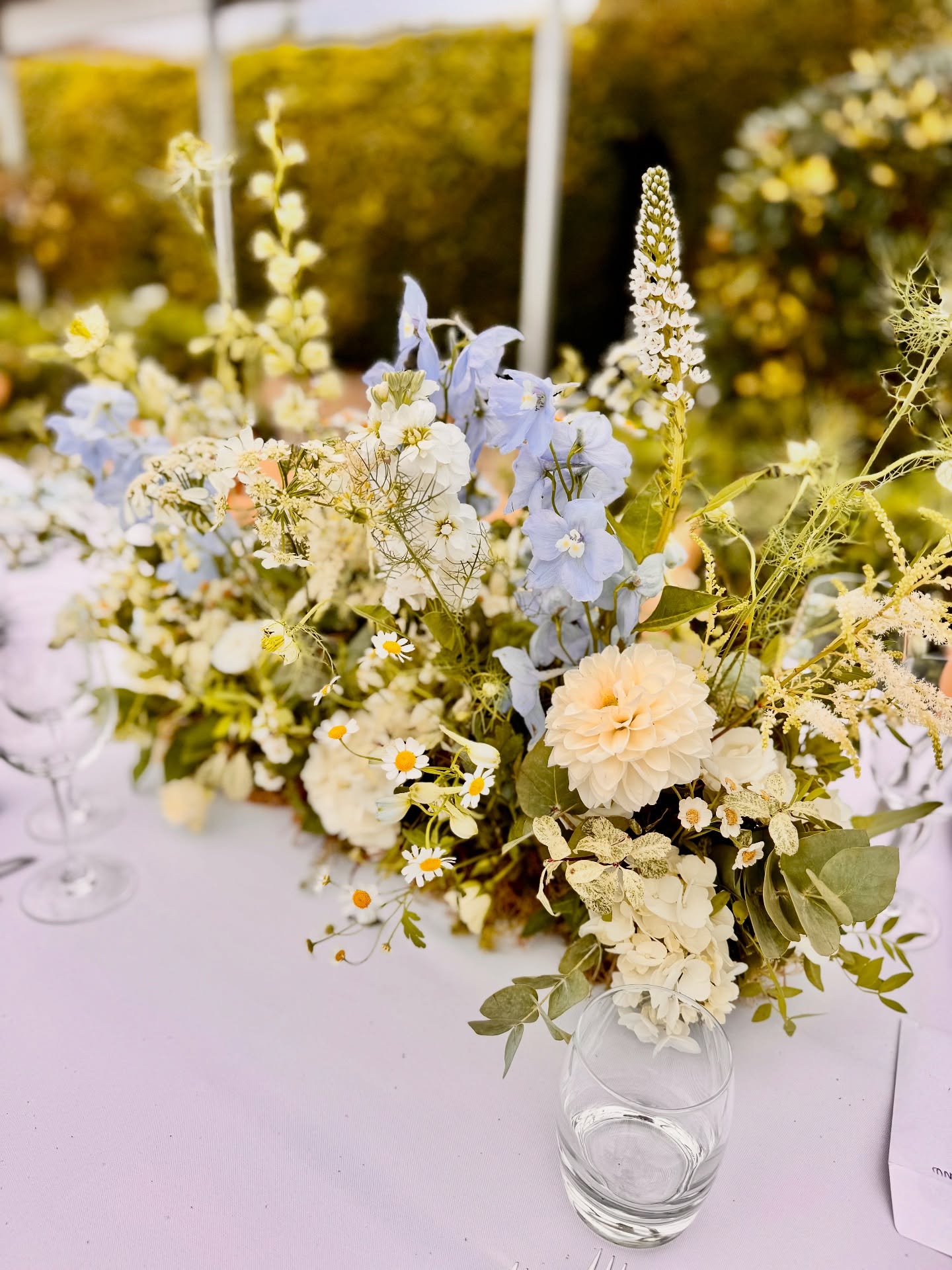 Many years ago we often overheard negative comments, because it was frowned upon if floral arrangements were reused throughout a wedding day celebration. Weâve overheard guests say âAre they really removing flowersâ or âAre you taking the flowers for another wedding?â Obvs rhetorical, because we were too busy to explain. I hear you say âCouldnât you wait for guests to leave?â We do, but sometimes turnaround time is tight and some guests linger. Weâve always encouraged the reuse practice and when our clients agree and see how much money they save; itâs a no brainier. The posted images are examples of how we repurpose our popular floral meadow designs. At the Kingston Estate, the designs are initially displayed for pre-ceremony in the Marble Hall, also as a guide to decorate the ceremony aisle in the Walled Garden and followed by decorating the celebration space on the long trestle tables in the Rose Garden; partition between the service platter space.
Times have changed and guests and clients expect floral designs to be repurposed throughout wedding day celebration spaces.
#totnesflorist #devonflorist #devonweddingflorist #sustainablefloristry