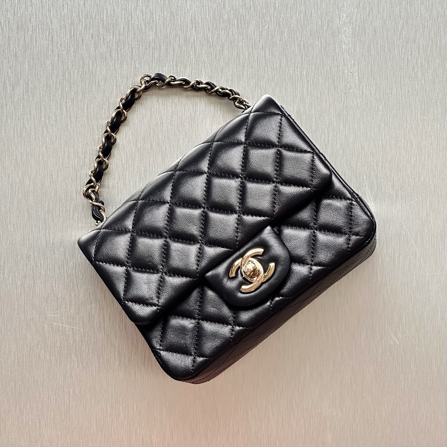 Chanel Mini Classic Flap in black lambskin with light gold hardware. The definition of timeless elegance, perfect for elevating any outfit.
For more information, please refer to the website link provided in the bio.
Listing no: 200956
Opuluxe.sg is not affiliated to the brands featured. We are an independent consignment platform of authenticated luxury products. All trademarks and copyrights remain sole property of the brands.