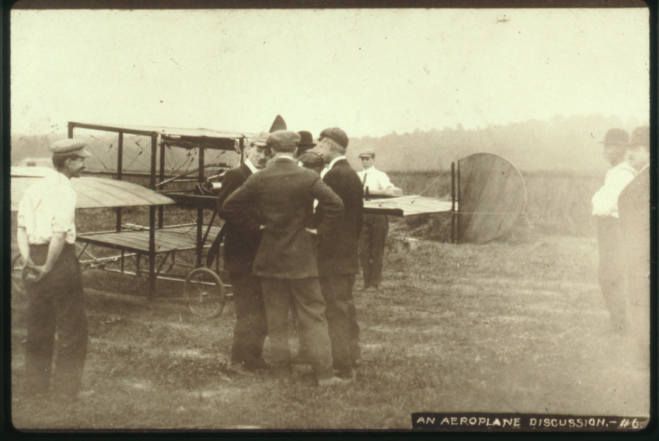 "An aeroplane discussion"
Members of the Rex Smith (a civilian aviator and businessman) team at CPA ca 1911