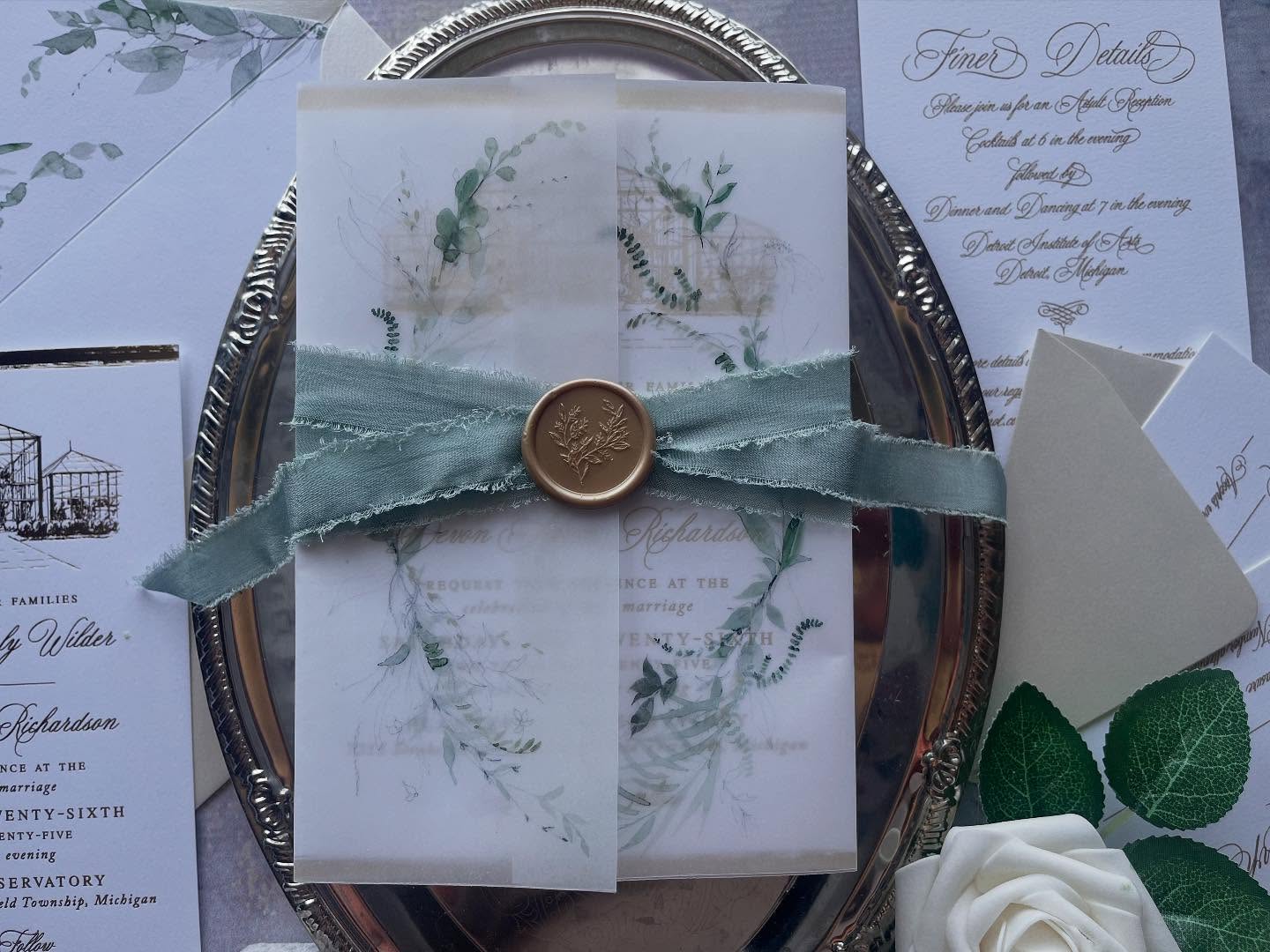 A wedding at Planterra Conservatory isn’t just a party. It’s an experience.
And this invitation? It’s the very first glimpse your guests will get. @planterraconservatory
Printed with gold foil on soft eggshell paper, wrapped in botanical vellum, tied with hand-dyed silk ribbon and sealed with wax — this suite feels like walking through the doors of the Conservatory itself.
The greenery is what everyone’s excited about. That lush, living atmosphere that makes your heart slow down a little. And this invitation gives them a taste of it right away.
But it’s more than that too. Years from now, this piece will still be here. Carefully tucked away. Soft around the edges. A keepsake from the day your family story began.
#PlanterraConservatory #MichiganWedding #LuxuryWeddingInvitations #WeddingHeirloom #GreeneryWedding #FoilPressedInvitations #CustomWeddingStationery #BotanicalWedding #PaperMuseCo #elegantweddingdetails