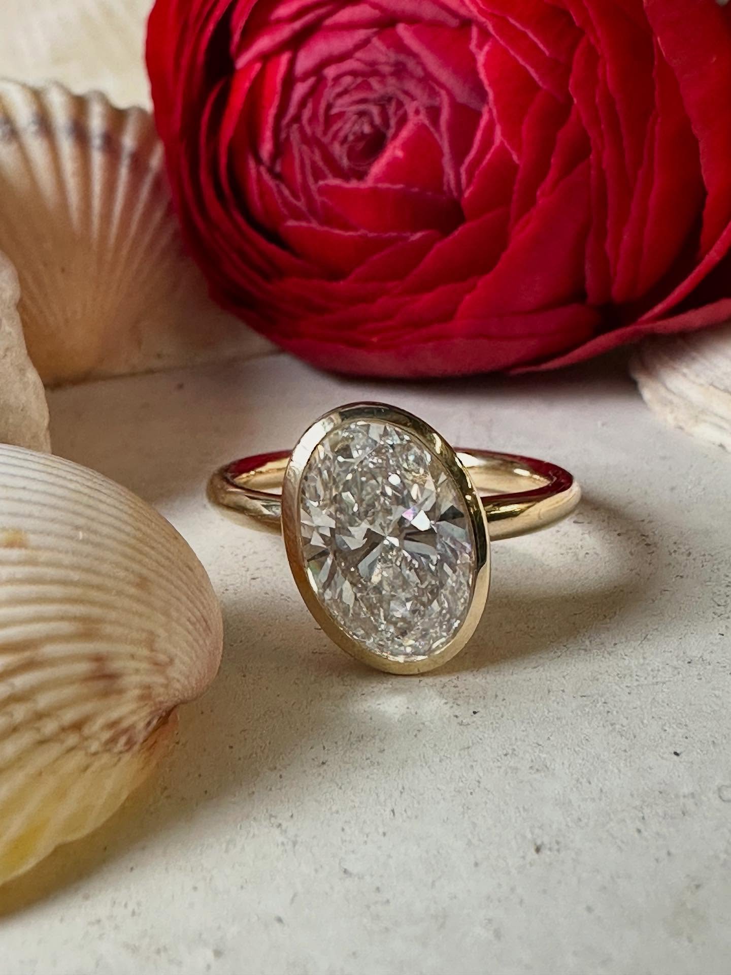 These two have a beauty of a love story. ❤️And the making of this ring is no different. The traditional beliefs of symmetry being what holds beauty have been a part of the human mindset since the ancient Greeks. Ancient Greek art heavily emphasized symmetry and proportion as foundational elements of beauty and order, deeply rooted in their philosophical and mathematical beliefs. The golden ratio and their idealized architecture and sculpture featured perfection as their goal. It was how they understood the world in regards to morality and the divine. But! As we’ve gone through the years of evolution of thought and aesthetics, we ‘ve seen a broader sense of beauty and the symbolism that it can hold. Abstract art has the ability to engage the viewer on a more personal level as it relates to an individual’s own viewpoint, experiences, thought and journeys. Which is more powerful individually. ✨ This ring, I feel gives this elevated view of beauty and life. One where it’s slight slant and atypical setting that differs from traditional symmetry makes it all the more beautiful and honors the experience of love and life. As we went back and forth deciding on the design, their daughter suggested this slant on the setting. She’s the wisest of us all to see how pretty being a little unsymmetrical is. It’s all about the ride and journey and the ups and down in a love story of a family. Biggest love always to this awesome family that I love ❤️ #customjewelry#lovestory#katherinelincoln#madeinnyc#nyc#goldsmith#sculpturaljewelry