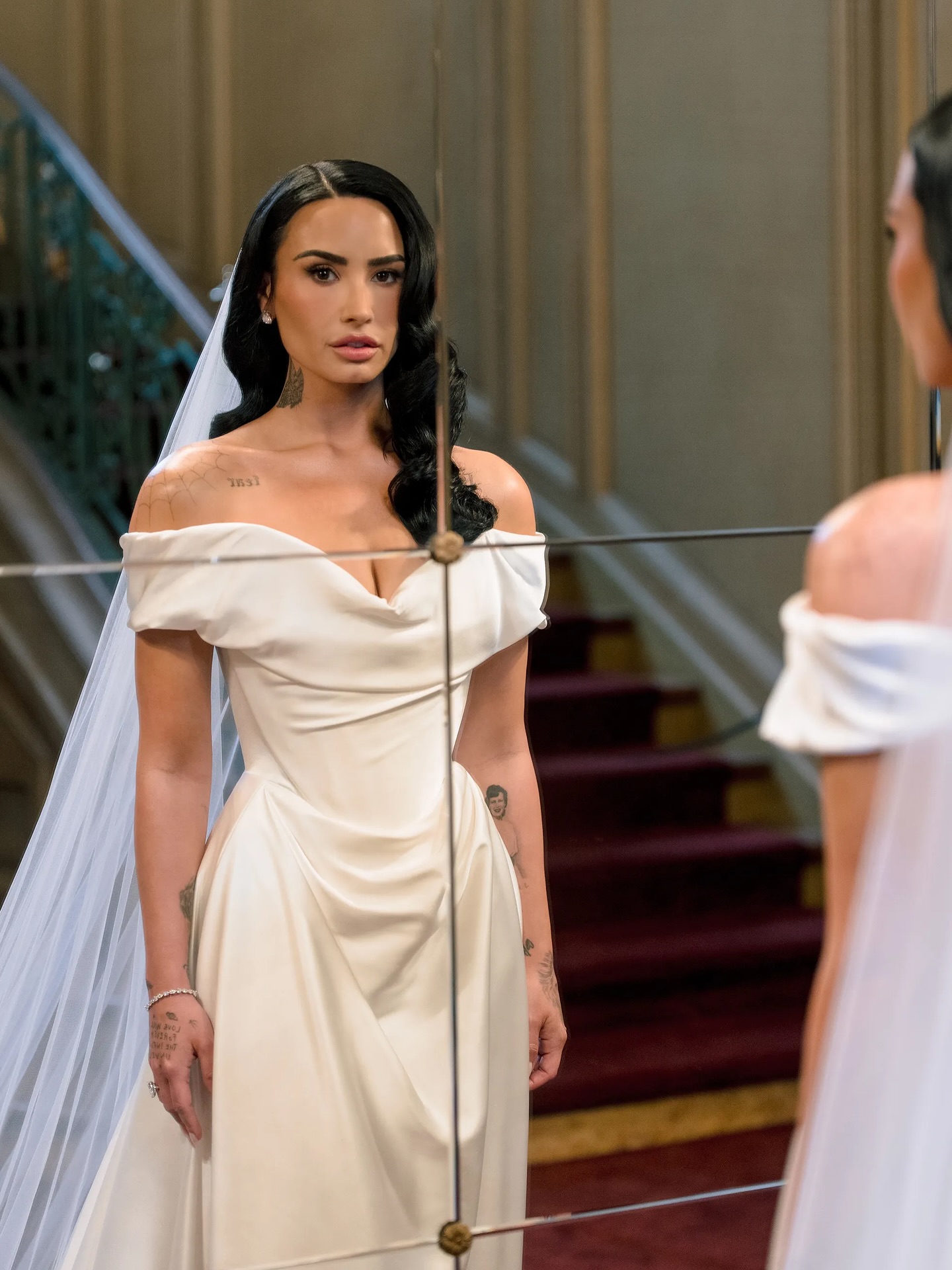 Loved Demi Lovato’s dress but not the Vivienne Westwood price? Meet Loren by Evie Young 😍 Named for the feminine icon Sofia Loren, our Loren wedding gown is a homage to classical glamour.
Made in liquid-smooth hammered satin, but also available in crepe, just like Demis, this gown’s luminous quality befits the silver screens of the Golden Age of Hollywood.
Statuesque in construction, the Basque waistline is enhanced by corsetry boning in the bodice, and centre draping in the skirt. The draped detail also adds drama and contouring to the look for extra dimension.
The draped cowl bodice develops feminine allure, meeting the off-shoulder straps that can be removed for a bombshell strapless look.
Complete the style with her co-ordinating hammered satin neck scarf, an elegant and minimalist final touch to the design.
#demilovato #evieyoung #moderndaywedding #wedding #hammeredsatin #statementdress