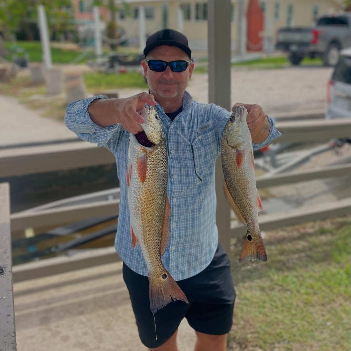 meet me at the #rodandgunclub cleaning station! Jeff and I had quite the morning aboard recently, he iced these two nice #redfish by 8 am and closed his day early before the rains came 💪🏻 The summer bite is really good at the moment, call me to fill your spot 📲305-778-5342 #a2fishingcharters #irtreels #cajuncustomrods #donnmarpliers #reelfishyapparel #palmythgloves #fourhorsementackle #fortressmarineanchorsusa #captainspreferredproducts
