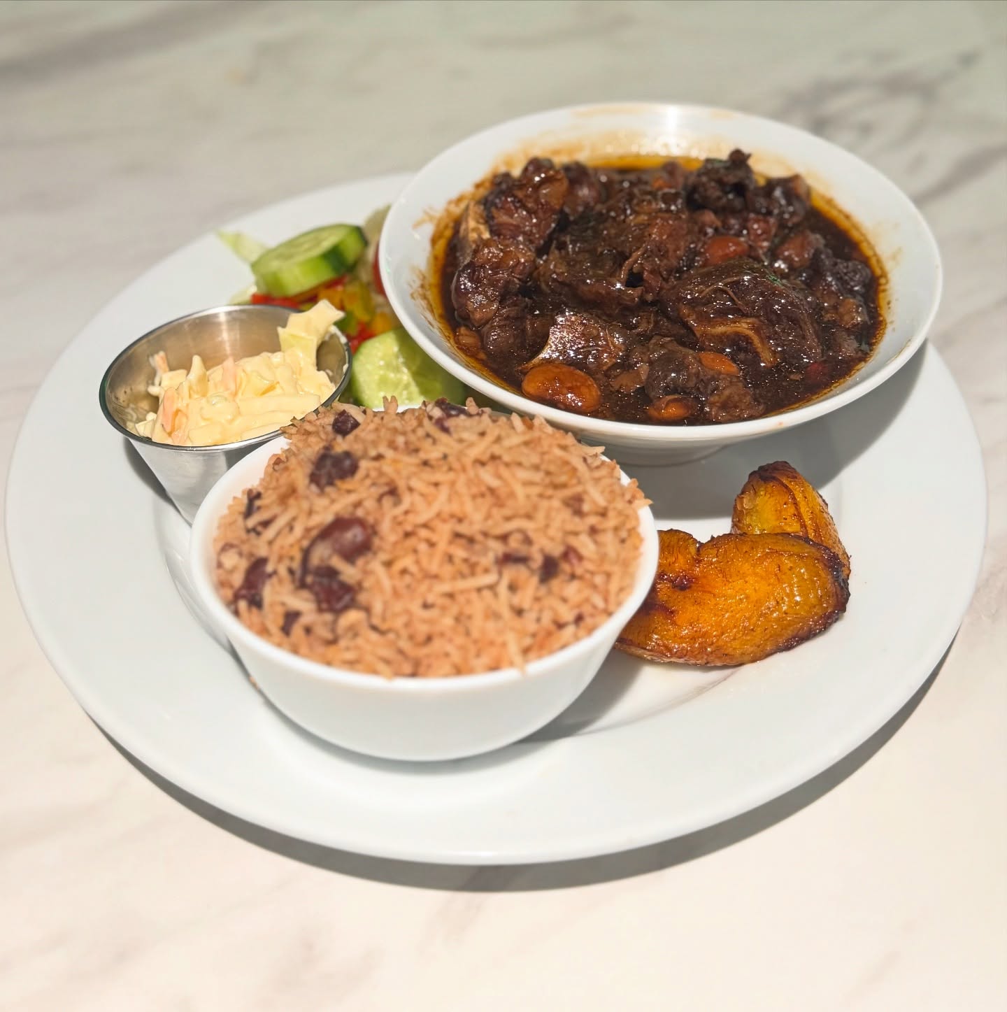 Big Flavours & Bigger Vibes ๐ฏ๐ฒ๐ฅOur Oxtial Comes Juicy, Tender And Falls Right Off The BoneโฆAs it Should๐
.
.
.
Follow us on TikTok!! paradise_romford
.
.
.
#Caribbeancuisine #jamaicanfood #chef #caterer #restaurant #romford #paradise #family #business #lounge #bar #jamaican #love #food #lounge #bar #essex #london #cocktails #events #catering #services #sweets #dinner #explore #explorepage #viral #festivals