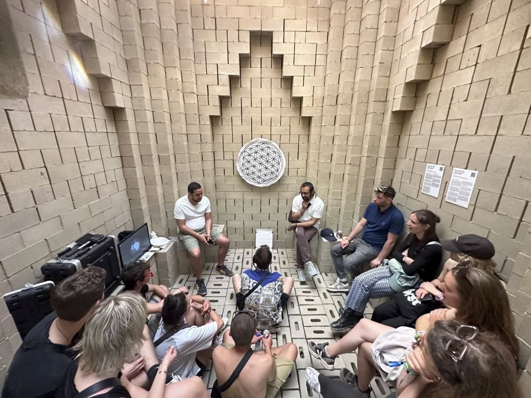 Sharing visuals from the performance work of our Samdani Art Award 2020 shortlisted artist Sounak Das, presented at Horst Expo 2025 titled 'There Will Come Soft Rains'.
Sounak is captivated by the experimental use of media and technology in art. He aims to analyze the causality of his lived experiences subsumed in the technocentric age, bridging the human, machine, and nature relationship as an intrinsic entanglement.
Originally designed as the physical structure for 'Where Do the Ants Go?'—an interactive artwork by Afrah Shafiq—the pavilion at Horst was developed through a collaboration between Horst, BC Materials, and students from the Faculty of Architecture at RWTH Aachen using circular, clay-based materials. Its presentation at Horst was made possible with the support of the Swiss Arts Council and Pro Helvetia through the To-Gather platform. This pavilion project was co-financed by the VLAIO Living Lab Earth Blocks. Jeremy Waterfield, Bregt Hoppenbrouwers (@bcmaterials_org), and Theresa Zschäbitz (BC architects/Junior Professorship act of building) worked together to translate Shafiq's vision into a structure of compressed earth blocks, reused wood, and prefabricated thatch elements in close collaboration with HORST Ateliers, @vlaio.be, and @democogroup
Beyond the festival, Horst functions as a lab and platform for innovation, bringing together artists, architects, curators, and researchers to explore new forms of creative expression and social engagement.
Photographs from @s.das.15
If you're in Belgium, be sure to visit There Will Come Soft Rains, on view at Asiat Park until September 7 as part of Horst Expo 2025. While Sounak Das’s performance has concluded, the exhibition continues to unfold across the site.
@dhakaartsummit
@samdaniartfoundation
@nadiasamdani
@rajeebsamdani
@dhakadiana
@rux_q
@swilin.hq
@s.das.15
@loveandotheroutdoorgames
@horstartsandmusic
@sazzad1985
@iftekharnoor
#dhakaartsummit #samdaniartfoundation #dhaka #sylhet #art #artwork #DAS #exhibitions #contemporaryart #srihatta #artistresidency #sculpture #SAF #sounakdas