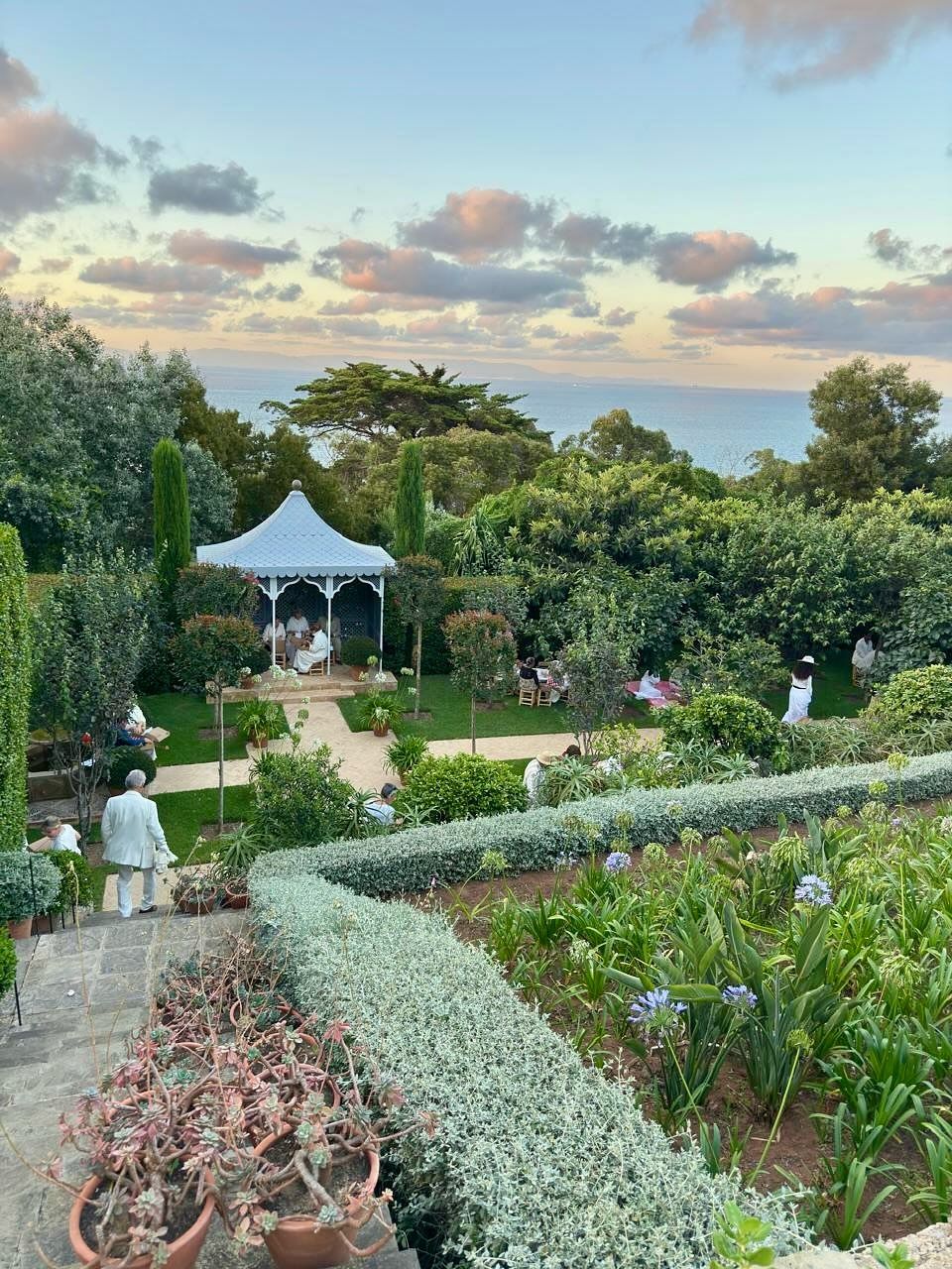 This past weekend, The Cherry Orchard by Anton Chekhov was brought to life in the gardens of Gazebo. Directed with brilliance by Rob Ashford and beautifully orchestrated by Madison Cox, it was an unforgettable evening of theatre, set against the enchanting backdrop of house and garden