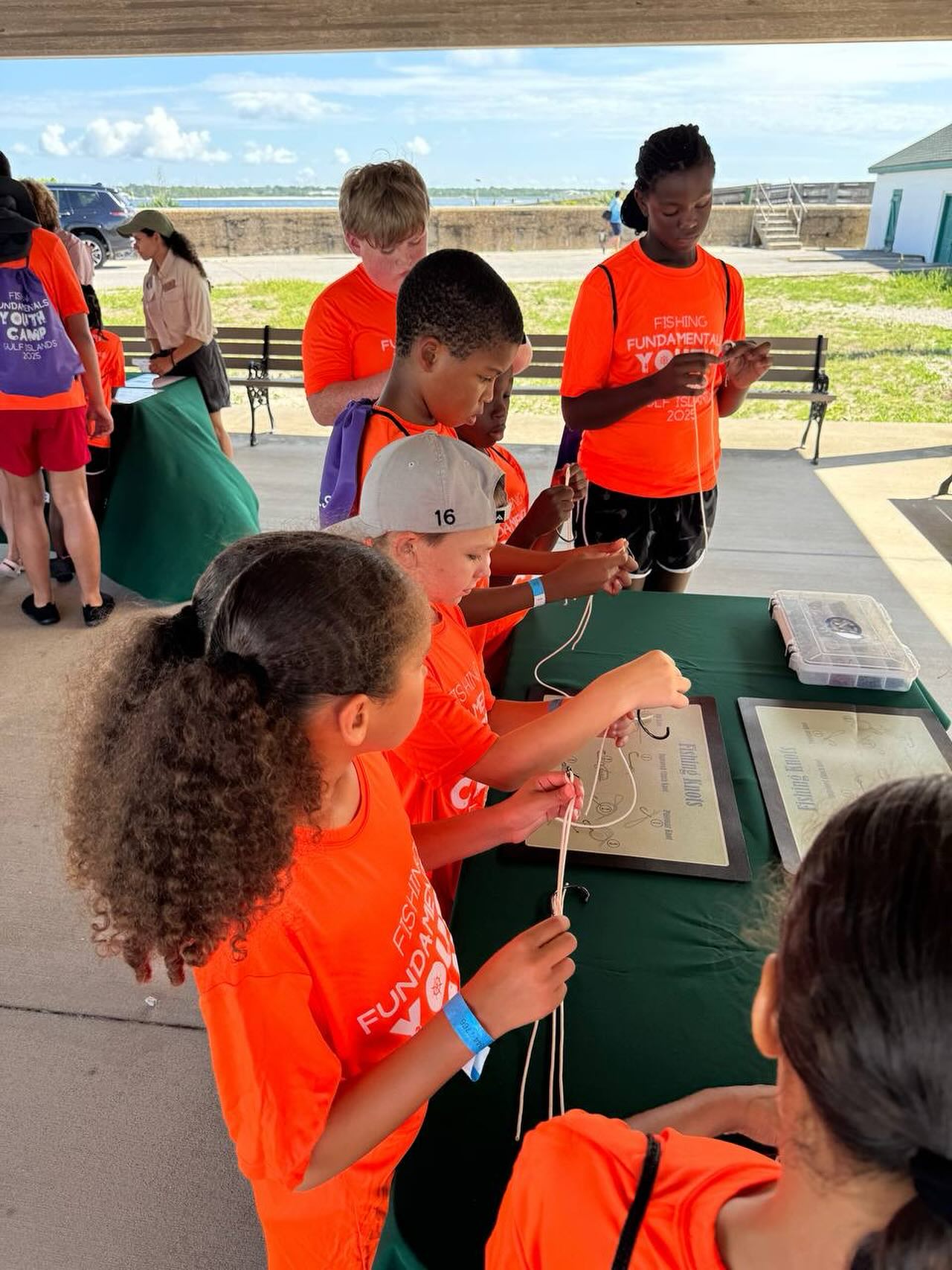 Tying it all together! Campers practice fishing knots with serious skill and focus.
#BlackGirlsFish #BlackBoysBoat #EbonyAnglers #FishingFUNdamentals #YouthFishingCamp #OutdoorEducation
#FortPickens #BlackKidsFish #GirlsWhoFish #BoysAndGirlsClub