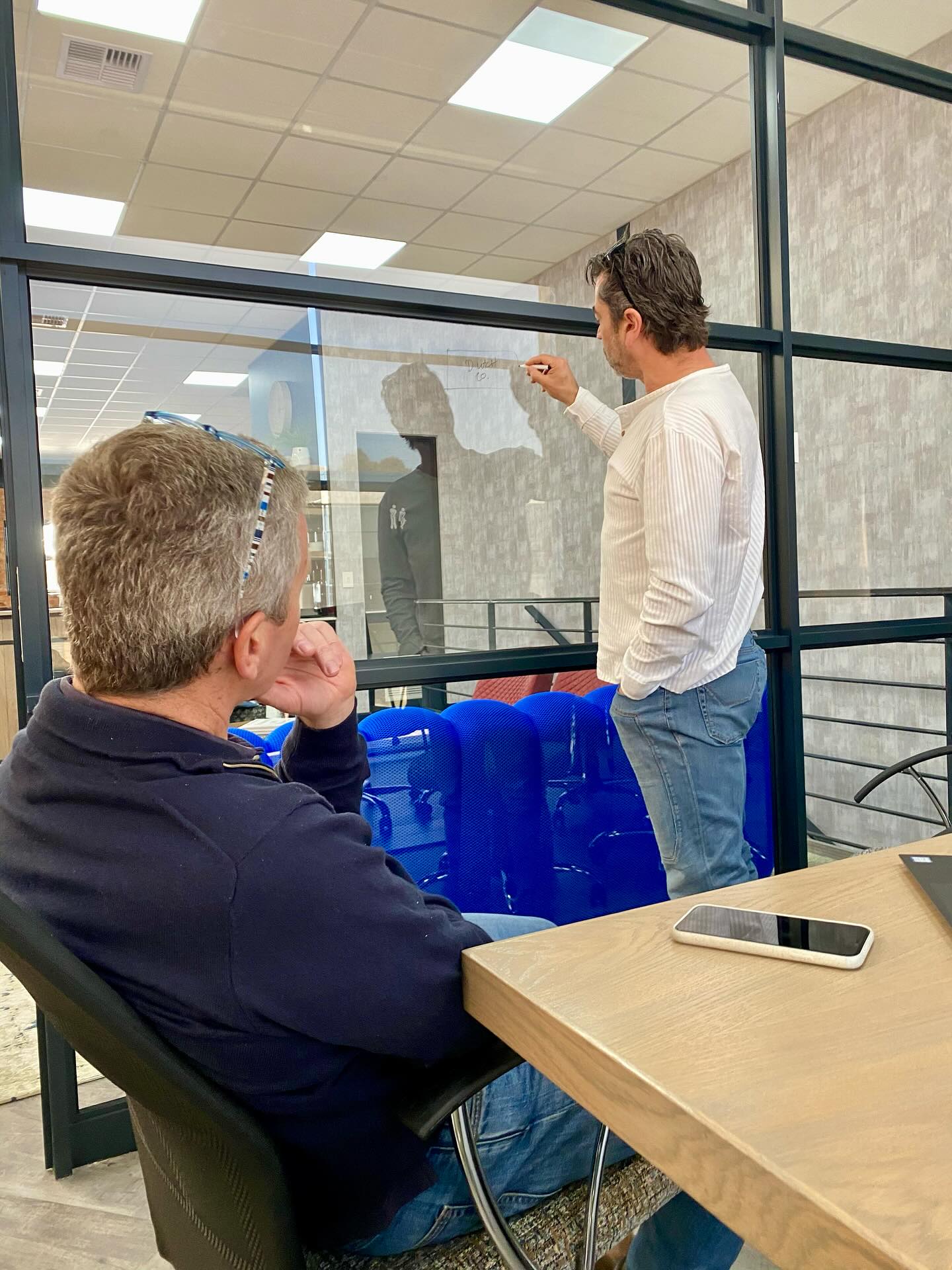 Big ideas start with clear glass and sharp minds. Plotting the next big move — one marker stroke at a time. #StrategySession #Brainstorming