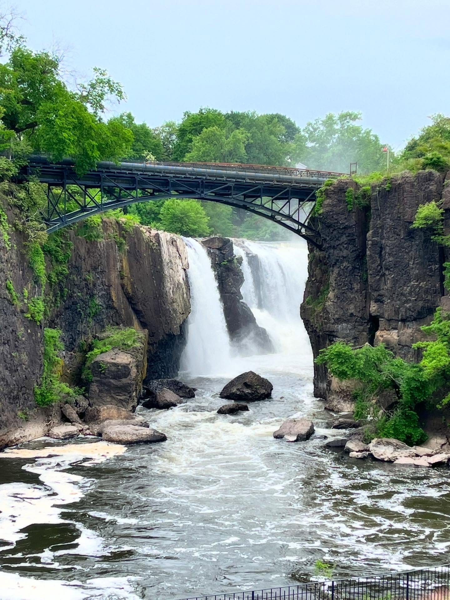 Tucked into the heart of Paterson, NJ — this waterfall roars with both power and history 💥🌊
The Great Falls of the Passaic might surprise you — 77 feet of rushing water right in an urban setting, once the force behind America’s early industrial boom.
Nature meets legacy here, and if you listen closely, you can almost hear both the water and the stories echoing through the gorge.
📍Paterson Great Falls National Historical Park
🏞️ Quick stop, big impact
⚙️ Alexander Hamilton approved 🇺🇸
#PatersonFalls #GreatFallsNJ #HiddenGemsNJ #JerseyViews #WaterfallWanderlust #UrbanNature #HistoryInTheFalls