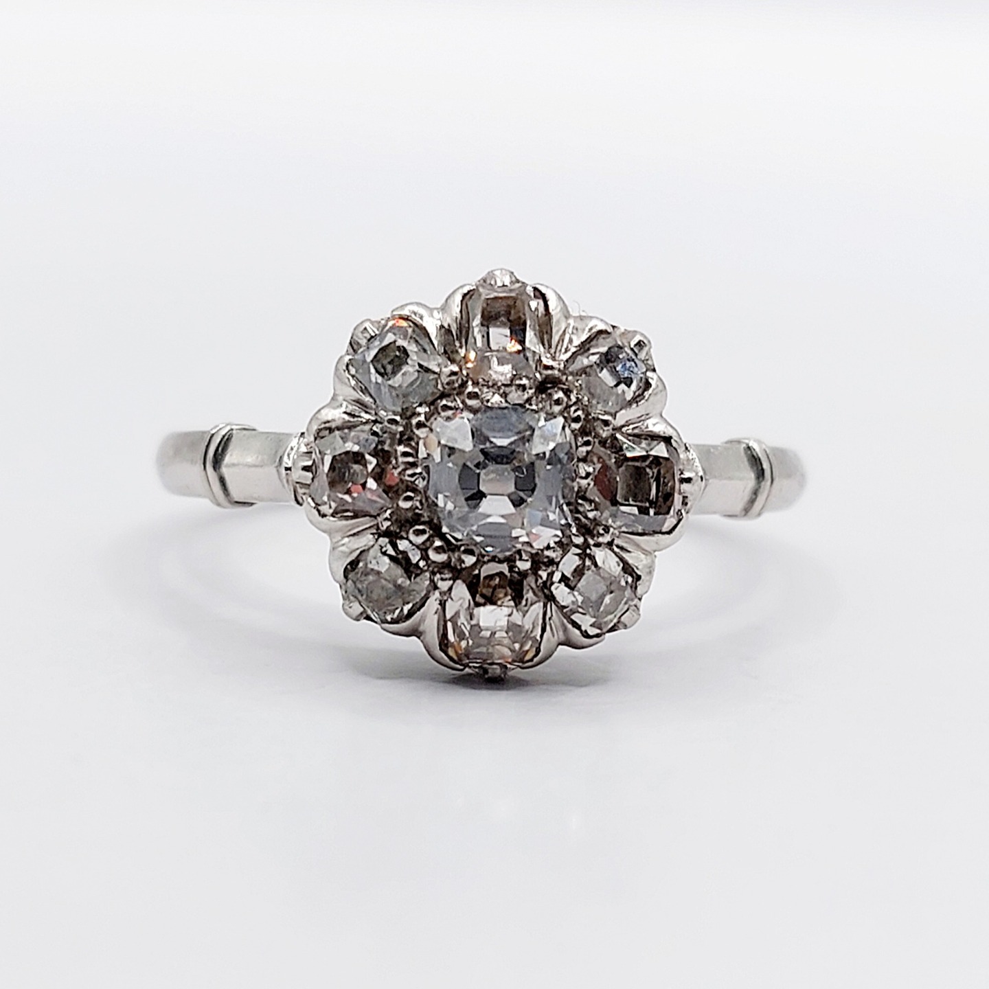 /// SOLD /// French art deco daisy ring Platinum set with 0.85 carats of old mine cut diamonds (circa 1920)
PRICE : 1140€
Magnificent and rare work by a French goldsmith
Size: 52 FR / 6 US
Weight: 4.31 g
Main diamond size: approximately 4.2 mm (estimated at 0.30 carats)
Secondary diamond size(x8): approximately 2.2 to 3 mm (estimated at 0.55 carats total)
The diamonds are in good overall condition, with small inclusions visible under a magnifying glass
Head size: 11.1 mm
Micro-scratches from use
Dog's head hallmark and goldsmith hallmark (French hallmarks)
#frenchjewelry #diamond #diamondring #antiquering #victorian #victorianring #marquisering #augustusjewels #vintagering #daisyring #daimondhaloring