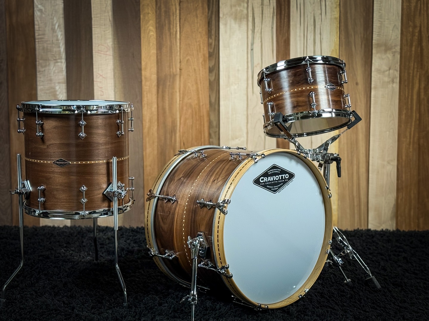 Custom Shop Walnut kit, with walnut inlay. It has 45 degree bearing edges and finished in satin oil. Sizes are: 8x12, 14x14, & 14x20.