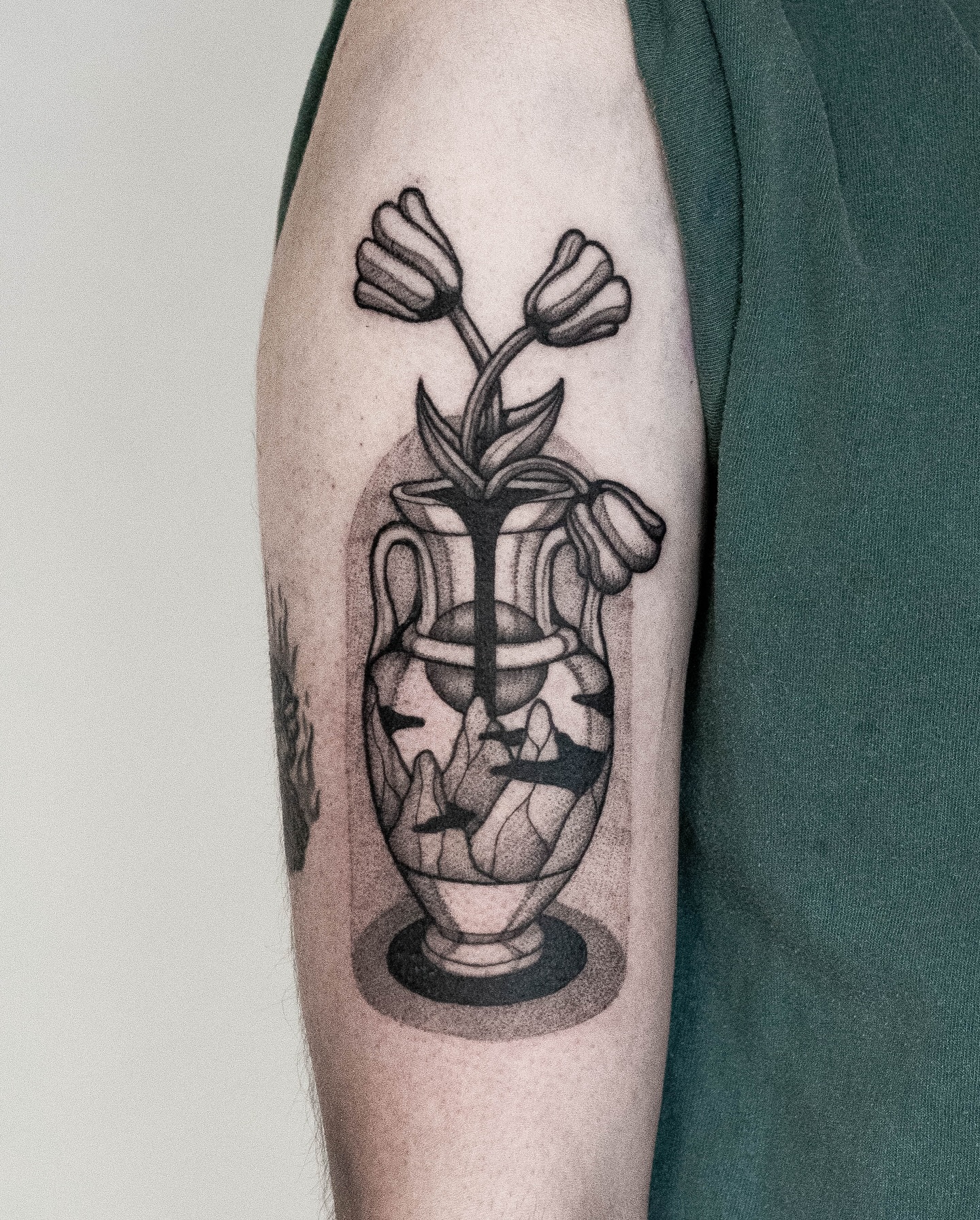 From the flash archive, a vase containing more than just tulips. A layered landscape, both blooming and eroding.
- thanks Alejandro!
#flashtattoo #blackworktattoo #surrealism #tattooart #tattoodesign #dutchtattoo #illustration #dotworktattoo #tattooeindhoven #blackwork #finelinetattoo #psychedelictattoo #minimalistictattoo #eindhoventattoo #graphicdesign