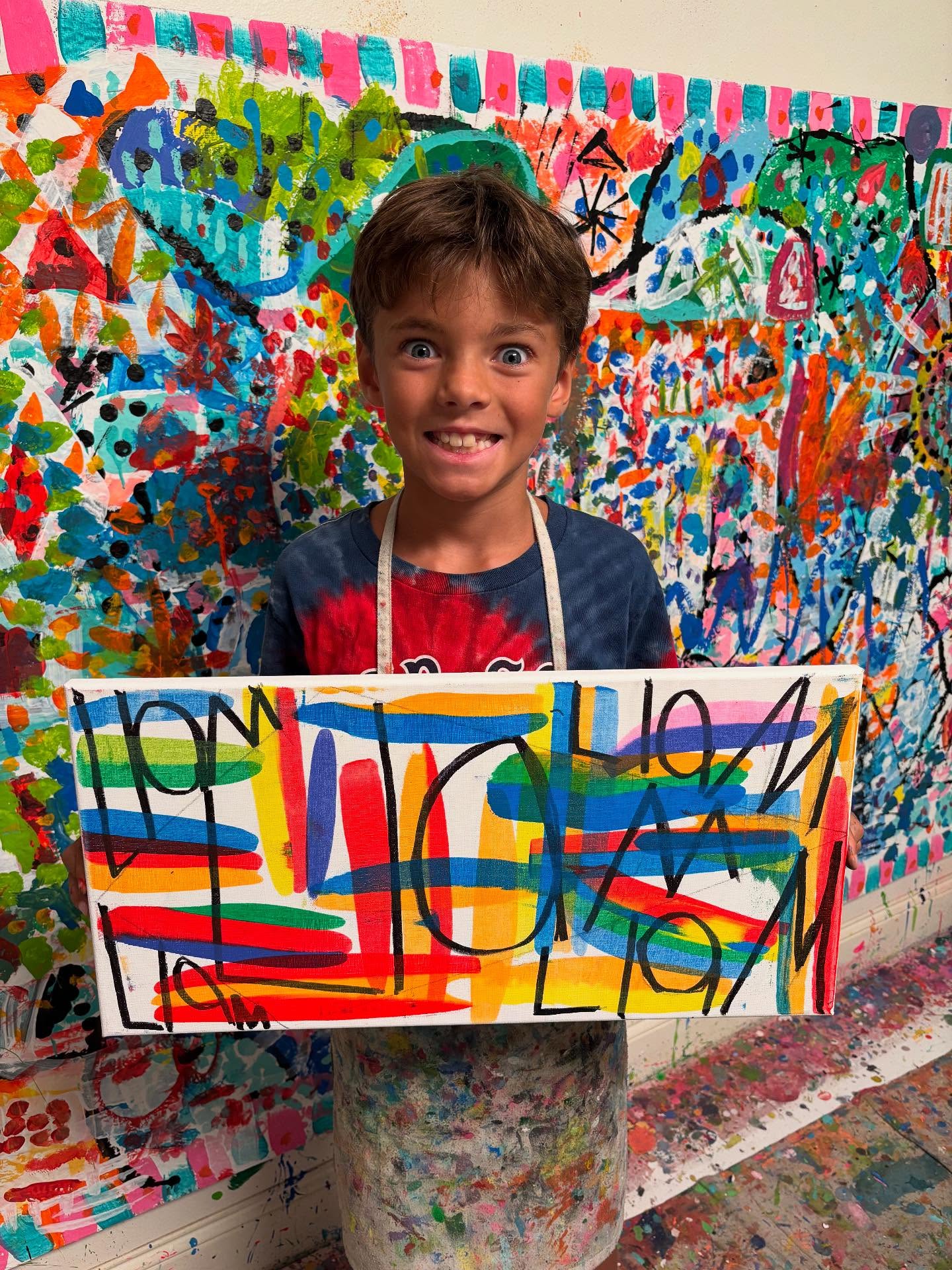 I absolutely love the kid's name art. It's fun to watch how experimental the kids are when you give them free rein over the paint and tools.