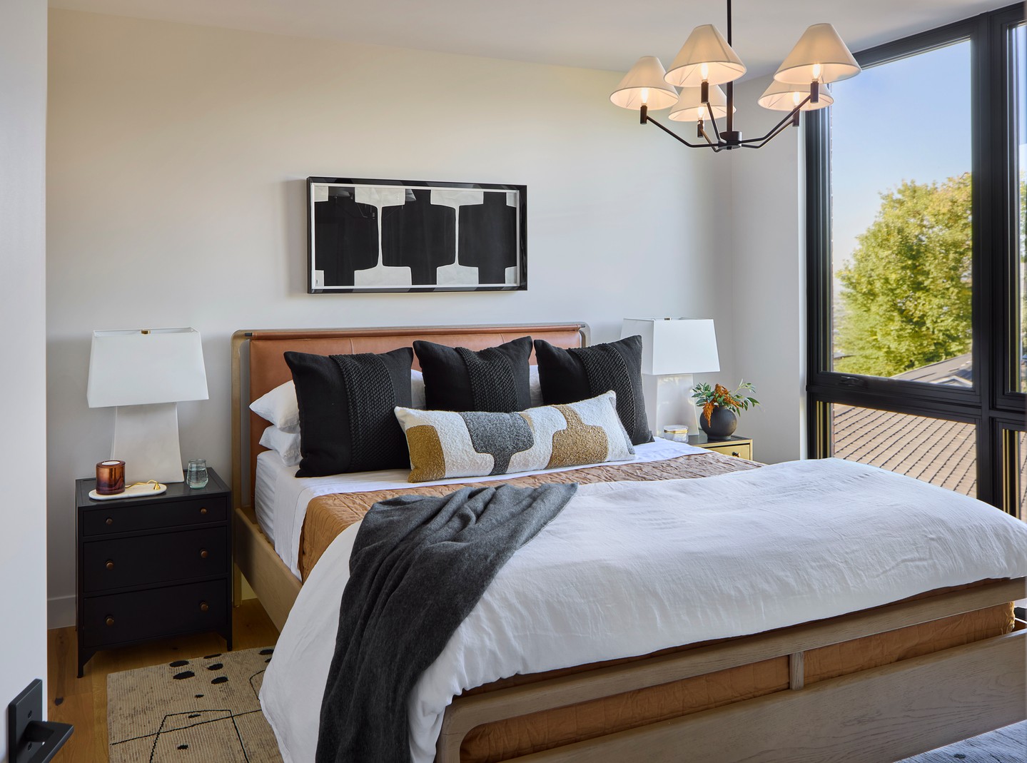 Small space, big feeling. 🤍 Floor-to-ceiling windows let the light pour in, while layered textures — from woven tones to soft cottons and rich leather — create warmth and depth in all the right ways.
It’s giving modern mountain retreat — inviting, elevated, and just a little bit rugged. Like the coziest corner of a boutique stay in Aspen or Vail.
Looking to bring this kind of layered comfort into your own space? We’d love to help you design something that feels just right. Click the link in our bio to reach out!