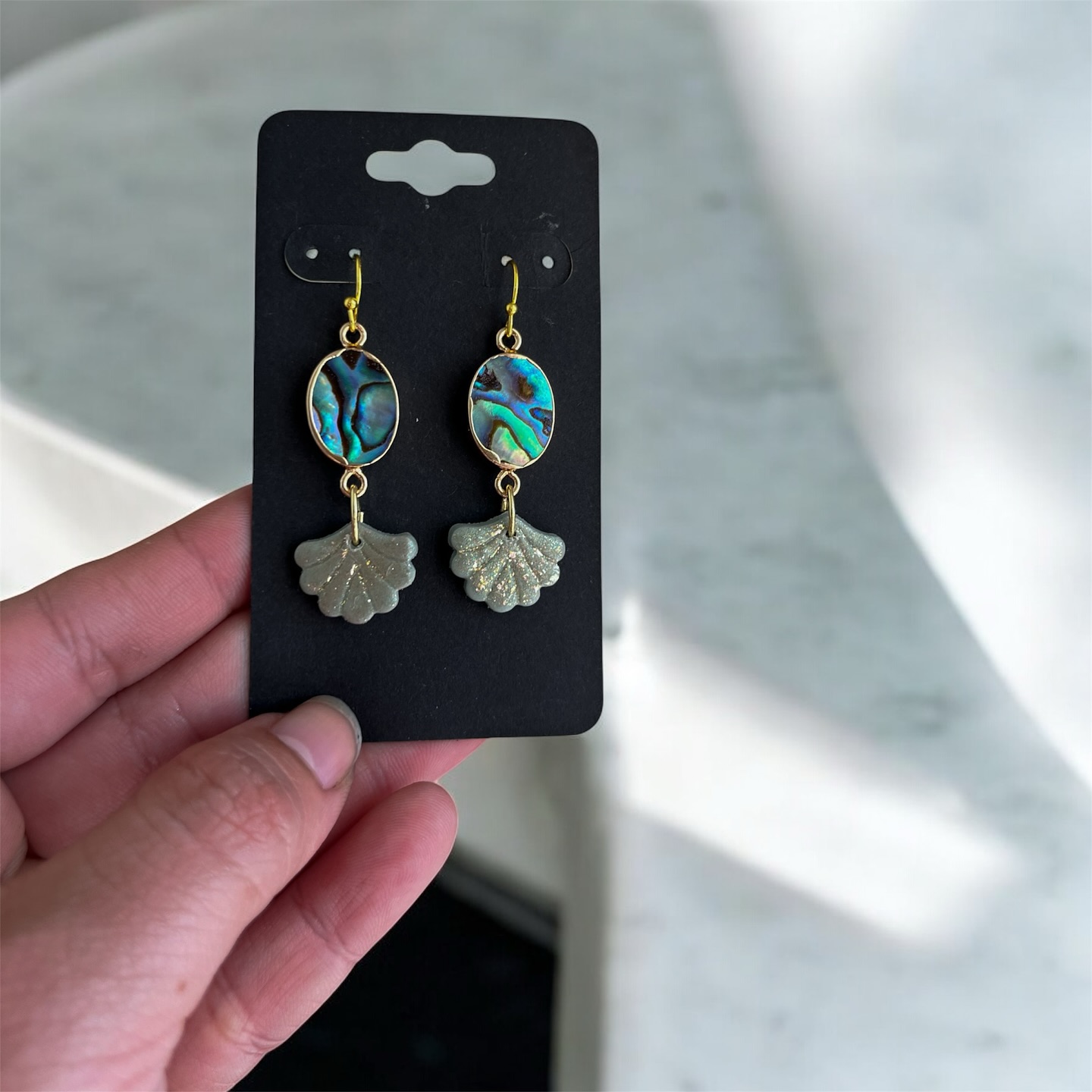 This or that? Which one is your favorite?? Comment below or vote!
My goal was to make something that you could wear year round while still enjoying summer vibes! What do you think?
These handcrafted earrings are lightweight and made out of polymer clay, hypoallergenic stainless steel, and abalone.
Handmade with love. Hecho con amor.