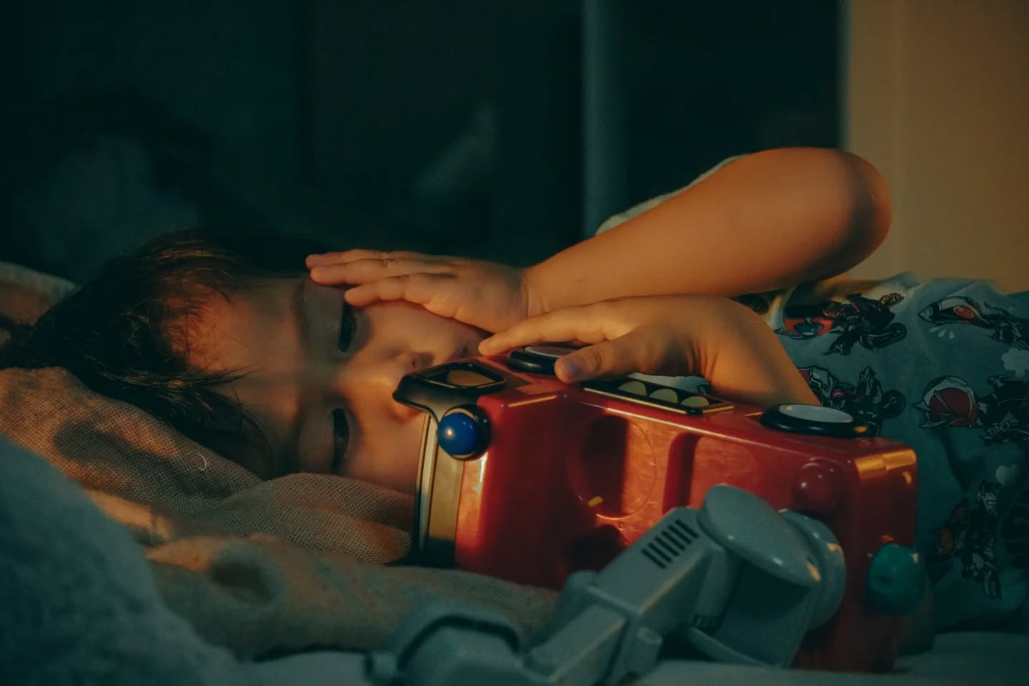 Ryūnosuke in a candid moment. Illuminated by the warm glow of the sunset streaming through the window, casting a beautiful reflection on his face.