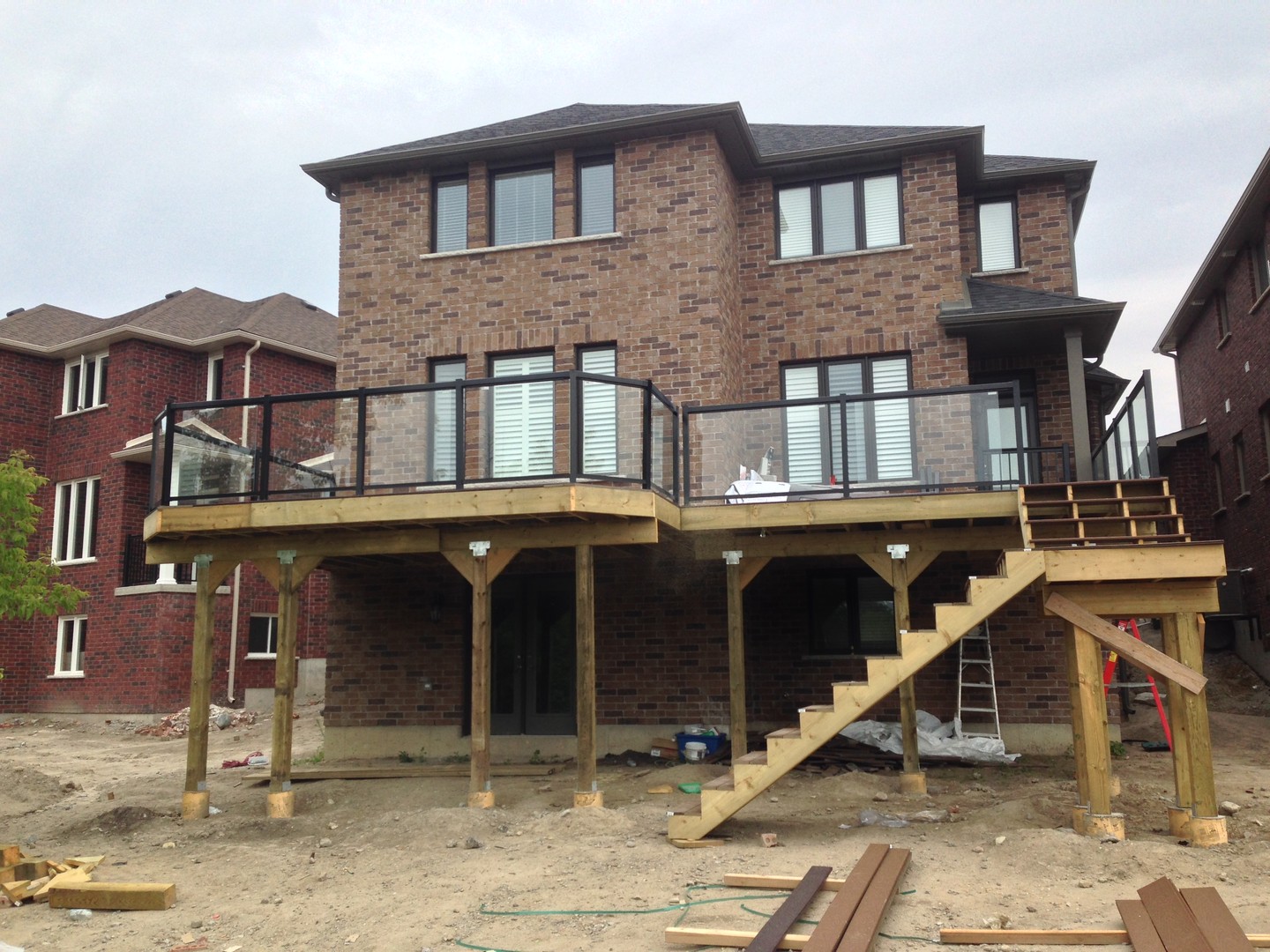 Glass rails, flush framing, and a layout that works with the house - not against it.
Still in progress, but already looking like a statement build.