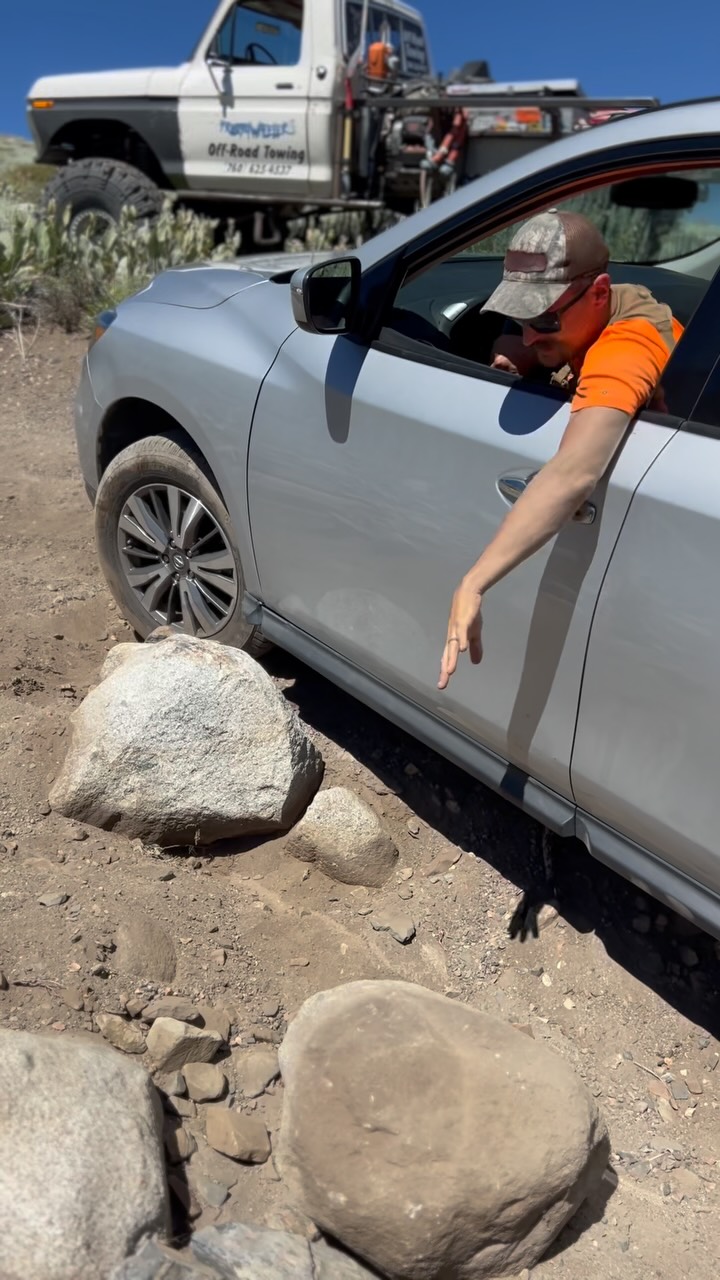 Complicated #vehicle #rescue on a rough bit of trail in #mammothlakes Customer tried backing down a bypass but the sides were too soft with large boulders to navigate. The vehicle became wedged between two rocks and as well as a large boulder almost puncturing the fuel tank⛽️😳
This obviously was the first issue to address. Any movement guaranteed a damaged tank. So we backed the truck up and used the rear winch and high fairlead to pick up the rear end safely. The boulder was just big enough and an awkward shape that I was unable to move it. So we switched to the #badlands jack (thank you @derekrickford ) so we could use the winch to pull the rock from underneath the vehicle.
With that accomplished we needed to get the vehicle off the large boulder on the driver front rocker panel without causing too much additional damage. We repositioned the #whitewhale and winched it over. I attempted to drive the vehicle up onto the hard pack, but it was just too soft and ended up almost back in the same spot.
So we repositioned the truck again and winched it back over, but this time the vehicle rolled back with the emergency brake on and in park. We physically and visually check for the several times throughout the #recovery but something happened to allow the vehicle to roll back several feet upon freeing it. Because we exercise extreme caution no one was hurt by the moving winch line, vehicle etc. and we were very fortunate that it was stopped by another large rock. We just repeated the earlier process but still had to navigate a large washout in reverse. To avoid sliding in we just hooked up the winch on the rear and assisted the vehicle back to safety #FROSTED #offroad #frosty4wheeler
