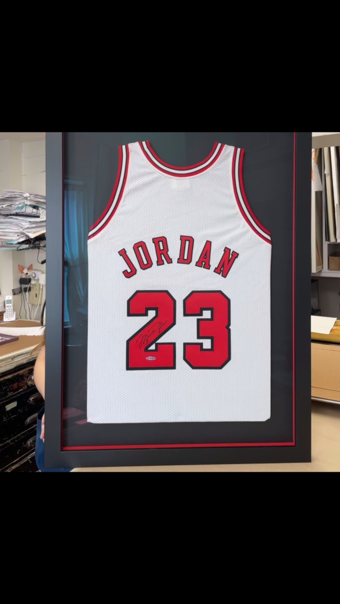 Such a fun project! I love the shadowbox sides in red. #jordan #basketballjersey #chicagobulls #23 #michaeljordan #shadowbox #autographed #customartframing