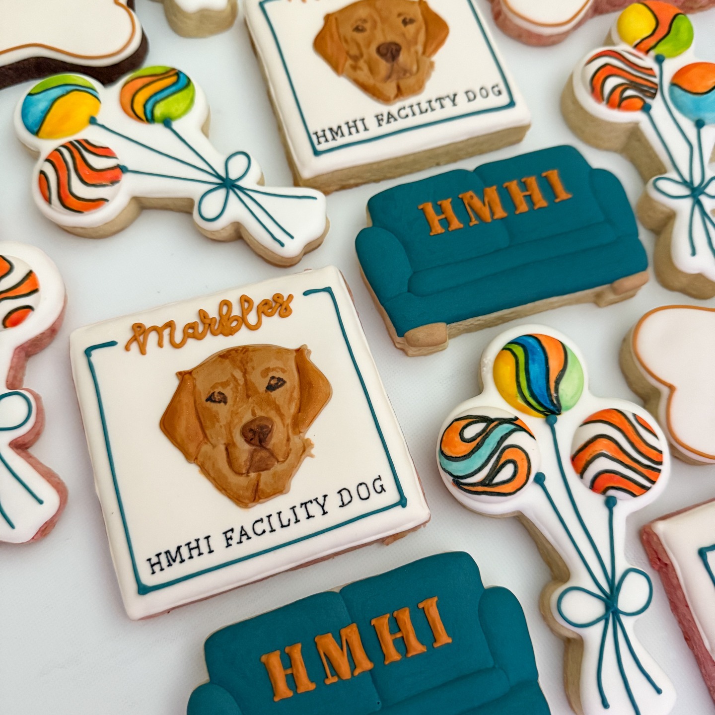 These cookies are for Marbles, the newest team member at Huntsman Mental Health Institute!
Marbles has been trained since early puppyhood to work alongside clinicians to help kids who are worried or scared. Sheās great at helping kids feel safe, building trust, and offering quiet support. Sometimes, just being near her is enough to make someone smile.
Having a facility dog is a project my daughter Elizabeth and her colleagues began over a year ago ā getting the right stakeholders involved, navigating red tape, and completing the application process. Before long, Marbles (from @patriotpawsservicedogs) was winging her way from Texas to her new home in Salt Lake City!
When sheās not working, Marbles splits her time between Joanna (Elizabethās colleague) and Elizabethās household, where sheās settling in with her human family and her fur brothers, Joshua and Rudy.
#somecookiesbecause_byduveen #decoratedsugarcookies #decoratedsugarcookiesofinstagram #lincolnnebraska #lincolnccokies #nebraskacookiers #geschenkeausderküche #backenmitliebe #dogcookies #couchcookies #marblescookies #facilitydogsofinstagram