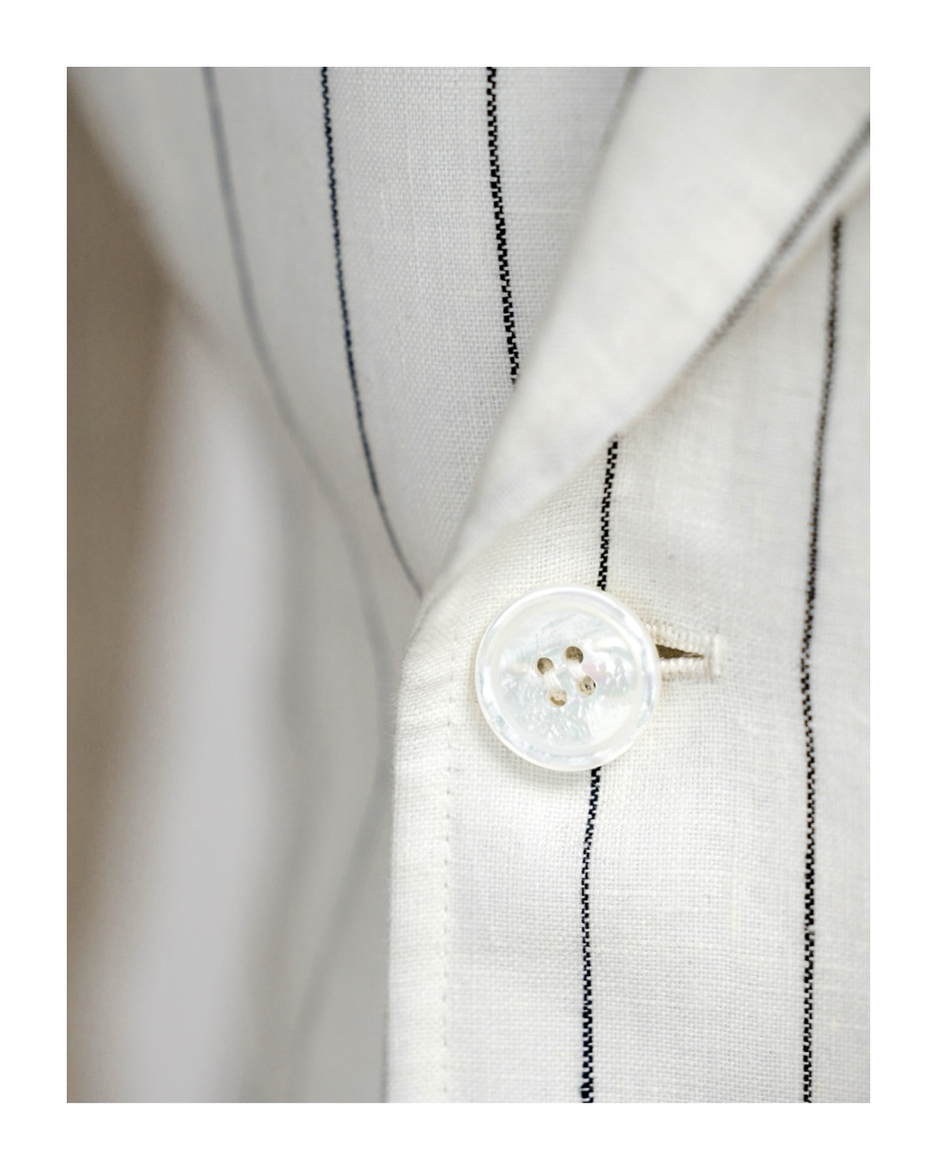 Mother of Pearl buttons. Details that whisper elegance.