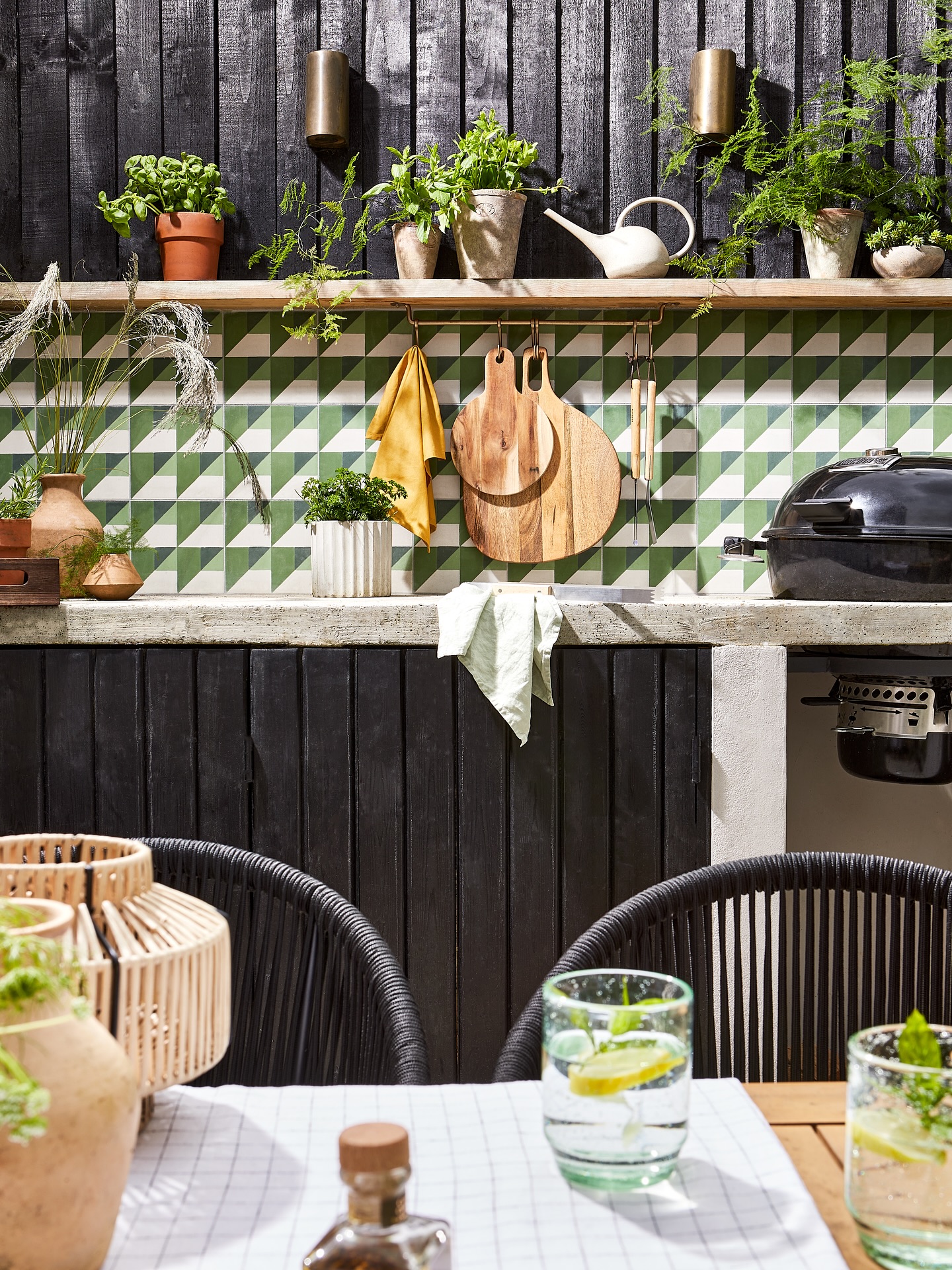 Outdoor kitchen… WITH A DIFFERENCE
Inspired by all those dreamy outdoor kitchens with built-in smokers, we wanted to bring a similar vibe to this garden – but tailored to our clients, who are all about proper BBQ (not smoking!).
Gas? Absolutely not. This one had to be charcoal – the real deal. And no wobbly BBQ stands here either. Instead, we designed a suspended BBQ grill, set into a steel-framed structure and then hung within a bespoke concrete worktop.
Because BBQs run much hotter than smokers (and aren’t insulated in the same way), this setup took some serious planning – from airflow and heat-proofing to all-important fire safety detailing. Let’s just say… there were a lot of site chats to get this one just right.
But super pleased with the result. A slick, seamless setup that works beautifully with the garden – with concrete tiles, soft planting and laid-back seating, made for long, lazy summer evenings. I’ve no doubt it’ll be sizzling again this weekend. Whatever it takes to make a client dream come true.
Happy Friday!
Design and styling @andthentheywentwild
Photography @still_loljohnsonphotography
Featured in @obsmagazine @guardian
For @itsmeelliegibson @scummymummies
outdoor kitchen design, BBQ area ideas, suspended BBQ, charcoal grill setup, garden entertaining, outdoor living space, concrete worktop, built-in BBQ, garden makeover, summer garden inspiration, stylish garden ideas, modern garden design, outdoor dining