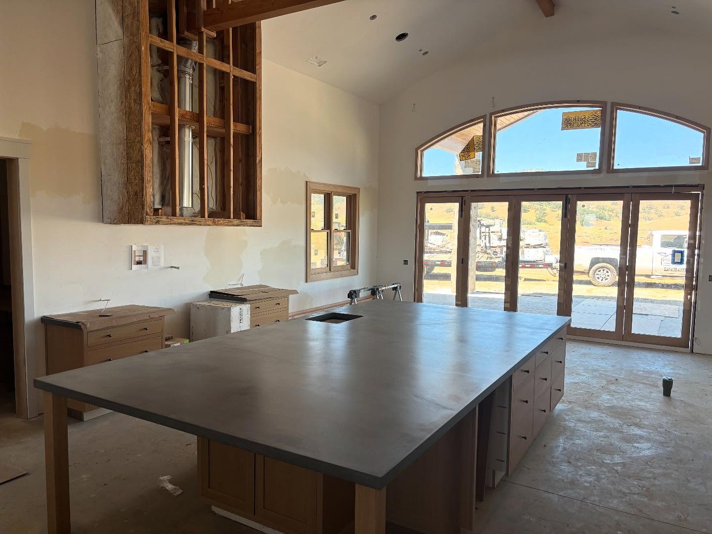 Massive island 14’3x7’7 made it safely into its resting spot. No seams. Only with quality concrete can this be done. This was transported 1 1/2 hr away up a mile long gravel driveway . #concretecountertops #concreteisland #dustycrete #kodiakpro #ictreactive #bergstromconcretedesigns #handmade #keepitlocal #gobigorgohome #buttecounty #colusacounty #sundaystudio #diamondbuiltconstruction