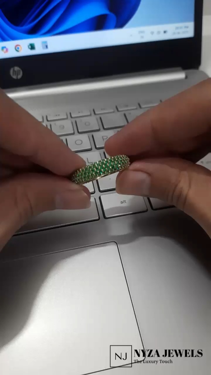 💚 A circle of forever, wrapped in golden grace.
✨ Emerald Eternity in a radiant pave setting—where timeless charm meets modern soul.
If you're leaning toward a more poetic vibe or want to highlight cultural heritage, I can tweak it! Want to tag any emotions, occasions, or gems in the spotlight?
- #EmeraldRing
- #EternityBand
- #PaveSetting
- #YellowGoldJewelry
- #FineJewelry
- #GreenGlamour
- #TimelessTreasure