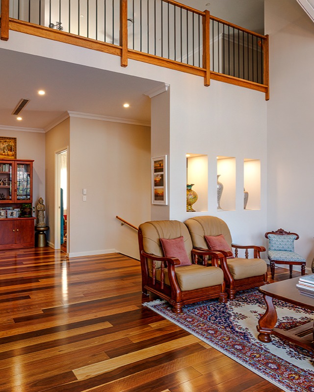 A formal lounge defined by generous natural light, elevated ceilings, and premium timber flooring - with a first-floor void creating visual connection and depth.
Designed by ATRICON.