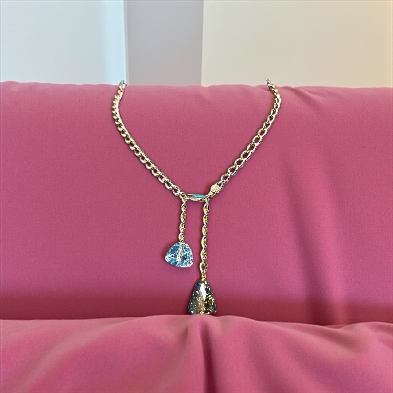 A touch of timeless elegance. ✨ Adorn your neck with this exquisite gold chain, featuring two dazzling Swarovski crystals that shimmer with a serene blue hue. Perfect for adding a sophisticated pop of color to any outfit. 💖 #Swarovski #Crystals #BlueCrystals #Jewelry #Necklace #GoldChain #FashionJewelry #TimelessElegance #Sparkle #LuxuryJewelry #StatementPiece #GiftForHer #JewelryStyle #Accessorize #ShopNow #CherieBella #SwarovskiStyle #DailyGlam #GoldenHourGlow #SparkleSeason #LuxeVibes #ModernMuse #LayeredLuxury #ChicAndShiny #JewelryGoals #ItGirlStyle