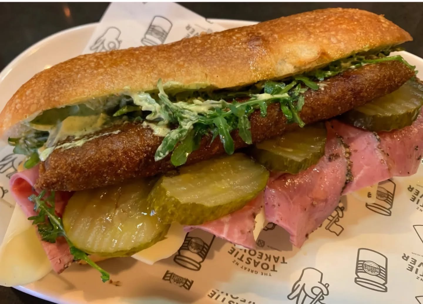5 days left to fill up on our delish toasty!
The Fungi Chicken
A chicken parcel filled with truffle mushroom creamy blue cheese sauce, rocket, pastrami, Swiss cheese, basil mayo and @mcclurespickles sweet spicy pickles. All encased in an ACME oli roll.
$20