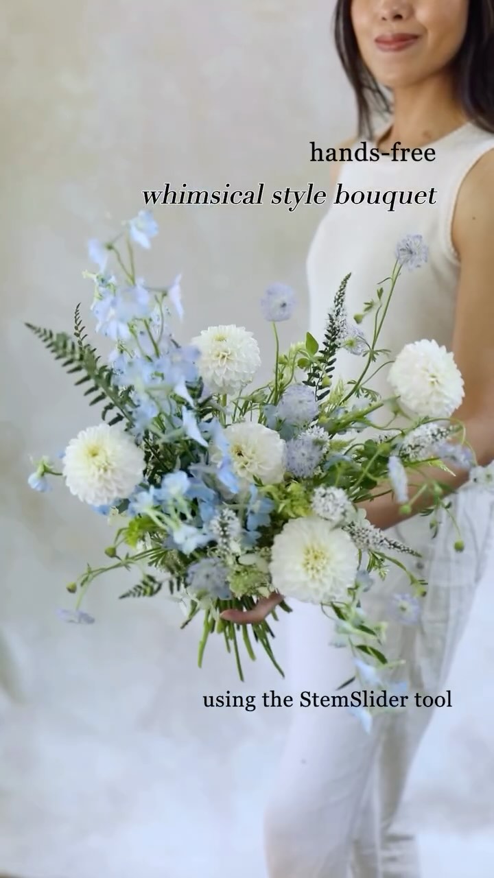 Here’s how I made a hands‑free, whimsical bouquet with white and blue summer blooms using the StemSlider bouquet‑making tool 🌿 First, I placed line flowers - delphiniums and ferns to create an asymmetrical outline and filled the space with hydrangeas and green pods. Next, I added main flowers white dahlias at varying heights and filled more space with green celosias. I grouped white lysimachias for texture, and added movement with airy lavender didiscus for a soft, light feeling.
If you’d like to explore the full bouquet recipe, please visit our blog, and I’ll share the full version of this video to everyone who purchased the StemSlider 😊 If you’re curious about the StemSlider tool, check our shop link in my profile!
Flowers: light blue delphinium, white dahlia, lavender didiscus from @connecticutflowercollective , white lysimachia, white hydrangea, green celosia, and green pods from my garden.
Tool: StemSlider bouquet‑making tool
.
.
.
.
#stemslider #stemsliderbouquet #bouquetdesign #flowerbouquets #sustainablefloristry #handsfree #weddingbouquets #flowerbouquet #giftbouquet #whimsicalwedding #locallygrownflowers #bouquet #bouquetinspo #farmerflorist #florists #gardenflowers