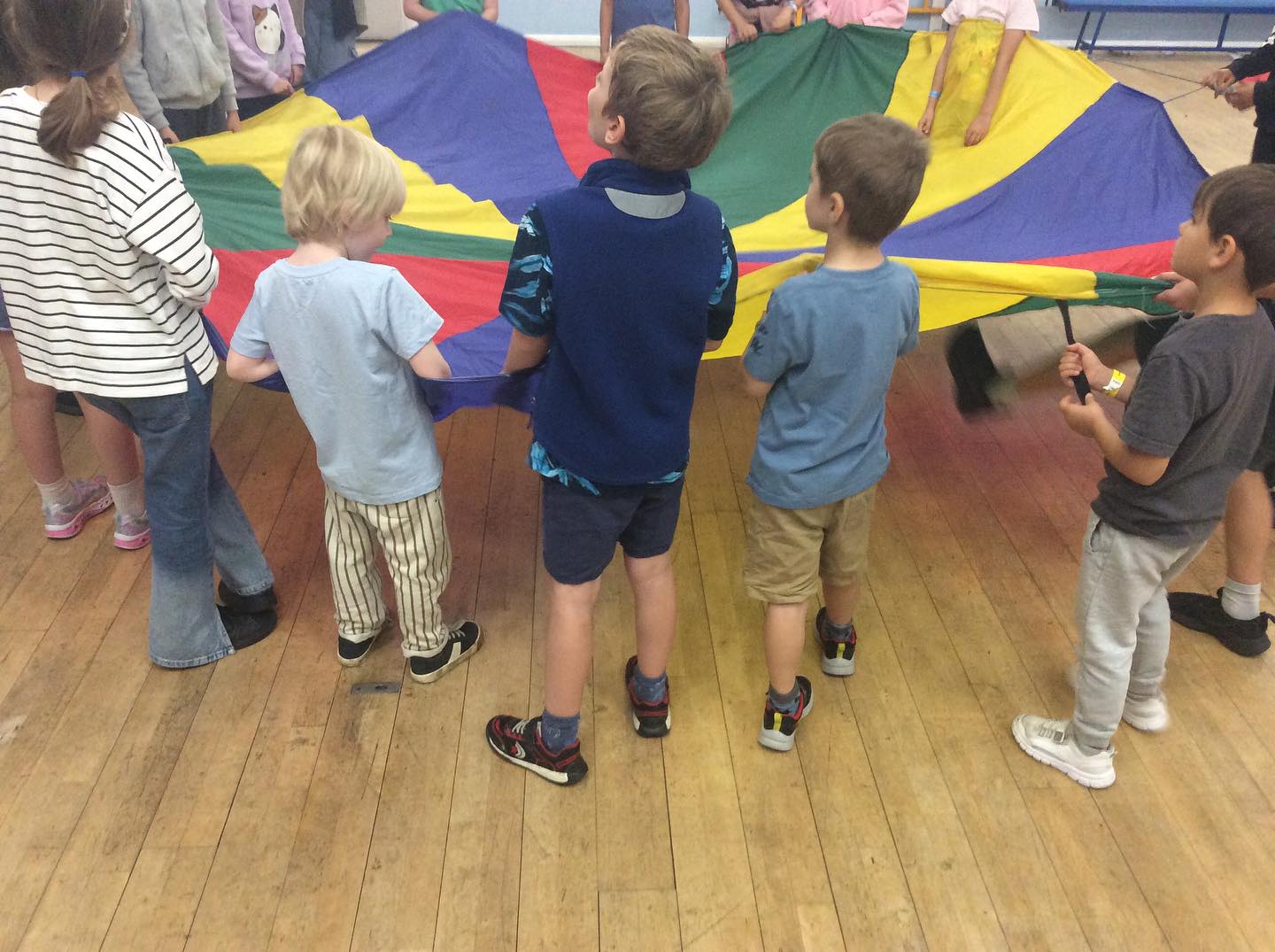 Week One. Thursday. Parachutes games. Fruit and vegetable guessing games. The children also had an opportunity to choose their activity today for the free play session. What a great first week. The children are all having the best time at all of our sites with their coaches.
