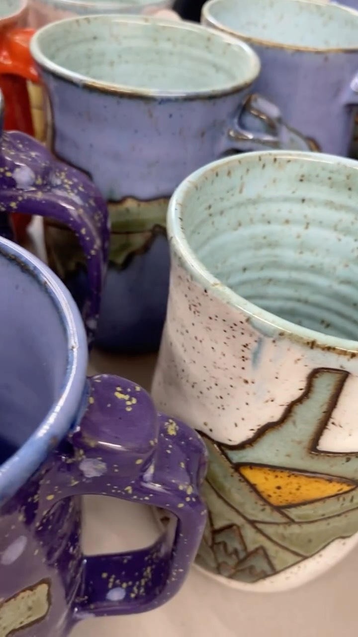 I just sanded a bunch of WV and Ohio mug bottoms. I did a variety of colors and played around with glaze combinations on the trees and mountains, each one is unique. I especially like the purple ones 💜
#wheelingwv #wheelingartfest #wvmugs #ohiomugs