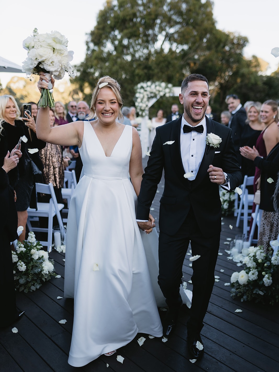 Love Stories ❤️ Laura & Jayden
Once upon a time, two souls unknowingly set out on a path that would forever change their lives. Their names were Laura and Jayden, and they met the way many epic teenage love stories begin, at a children’s birthday party.
It was Grade 6, and Tori’s 12th birthday was in full swing. Jayden was doing what any 12 year old boy would be doing, trying to impress his mates with trampoline tricks. But as he bounced around, something, or rather, someone, caught his eye.
Across the yard was a blonde girl with the most dazzling blue eyes, watching him. He didn’t speak to her that day, but he noticed her. And little did he know, she noticed him right back.
Laura turned to her friend Tori and whispered, “Wow, he is so cute. Who is that?”
The following year, they both started at the same high school. Their lives began to orbit each other naturally as they moved through the teenage years as best friends. They’d hang out at school, catch up after class, hit the tennis courts, or make the all important pilgrimage to Maccas for nuggets and deep chats.
Laura never thought of it as anything more. It just made sense that he was her bestie. But Jayden? Well, he was quietly smitten the whole time.
Then they turned 18.
With that came licenses, freedom… and a noticeable shift. Suddenly, the texts became more playful, the banter a little flirty. Something that had always been there was now rising to the surface.
They started seeing each other more and more. And they both felt it. That unspoken thing between them wasn’t hiding anymore.
And they’ve been inseparable ever since. 💛
📸 @soulflareweddings
💒 @bramleighestate
💐 @foxy_evergreen
🚗 @allclassrides
🎤 @celebrant_ruby
🎶 @melbentco
#melbournebride #melbournewedding #melbournecelebrants #melbournecelebrant #bramleighestate