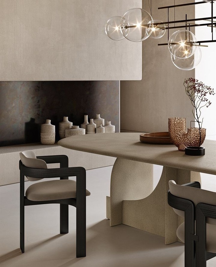 An interplay of soft textures and clean lines. This space speaks through its simplicity, where every detail, from the ceramic table to the lighting, creates a harmonious balance.