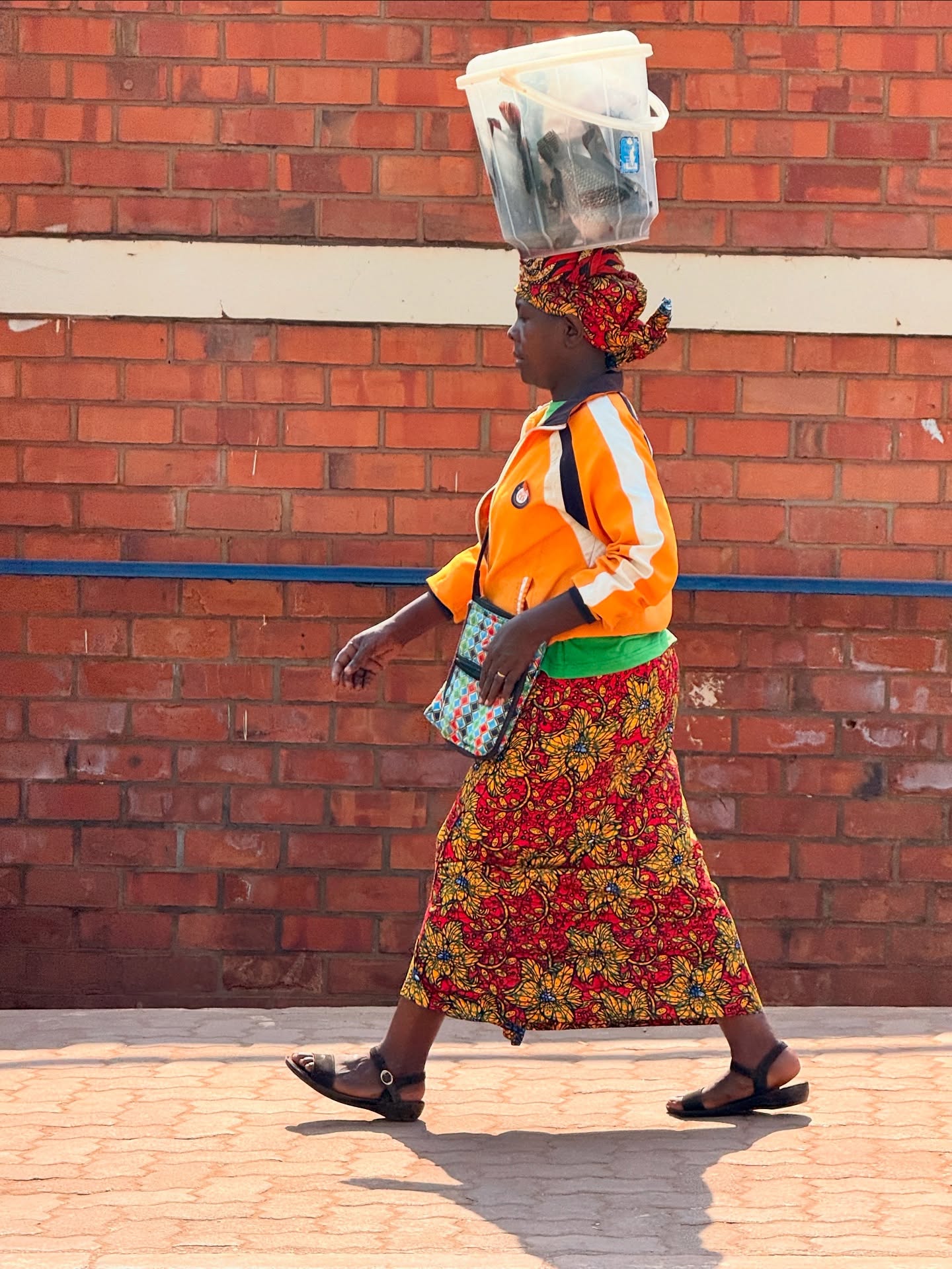After a powerful and packed few days in Kigali, we headed north—through rolling hills and lush countryside—toward the Uganda border and our next stop: Lake Bunyonyi. 🌿
The journey itself was a highlight:
🚐 Passing through villages with waving children and fields of tea, rice, bananas, and cassava
🍓 Sampling cape gooseberries from a roadside vendor (tart and sweet!)
🌍 Watching the landscape—and infrastructure—shift dramatically as we crossed into Uganda
One of the most striking observations? The second you leave Rwanda’s immaculately paved, palm-lined roads, you feel the difference in Uganda’s pothole-riddled dirt tracks. That contrast tells a deeper story.
Rwanda, though small, has made major investments in infrastructure and cleanliness post-genocide—part of a national push toward unity, modernization, and tourism. Uganda, in contrast, is larger and more decentralized, with incredible beauty and spirit, but fewer resources allocated to rural infrastructure. You feel the shift not just in roads, but rhythm.
Our destination: Lake Bunyonyi, known for its misty hills, peaceful waters and small communities spread across 29 islands.
Ringed by terraced hills, it’s one of the deepest lakes in Africa—and bilharzia-free, making it safe for swimming. A place of serenity, storytelling, reflection, deep conversation and authentic connection.
Much more soon about our lakeside experience—but for now, just soaking in the beauty of the journey. 🚐✨
#ListenThinkAct #globalclassroom #eastafrica #ugandatravel #purposefultravel #socialimpact #lakebunyonyi #traveldeeper #offthebeatenpath #studyabroad #bordercrossings #familytravelafrica #everywhereclassroom #listenthinkact #globalclassroom #leadershipdevelopment #socialimpact @globallivingston