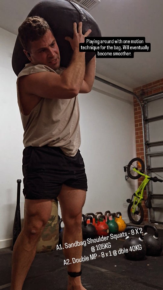 Yesterdays Training | 4th AUG 2025
A1. Sandbag to shoulder 8 x 2 @ 105kg
A2. Double military press 8 x 1 @ 2 x 40kg
B. Clubbell shield casts 3 x 10/10 @ 20kg
C.Pull-ups +5kg: 3 x 5
Been working on the one-motion technique for sandbag shouldering. Horizontal pick-up, row to high chest, then drive with the hips. Lot more biceps, lot less momentum. Feels weaker right now, but it’s a more scalable method long-term. Vertical pick-up lets you launch it straight from the hips to the shoulder, but that doesn't always work with heavier bags.
This version gassed me more than usual.
Hit some rope later in the day to loosen up and get the blood moving — helps me come back down and recover for the next one.
#sandbagtraining #kettlebelltraining #hardstylekettlebell #strongfirst #ropeflow #movementpractice