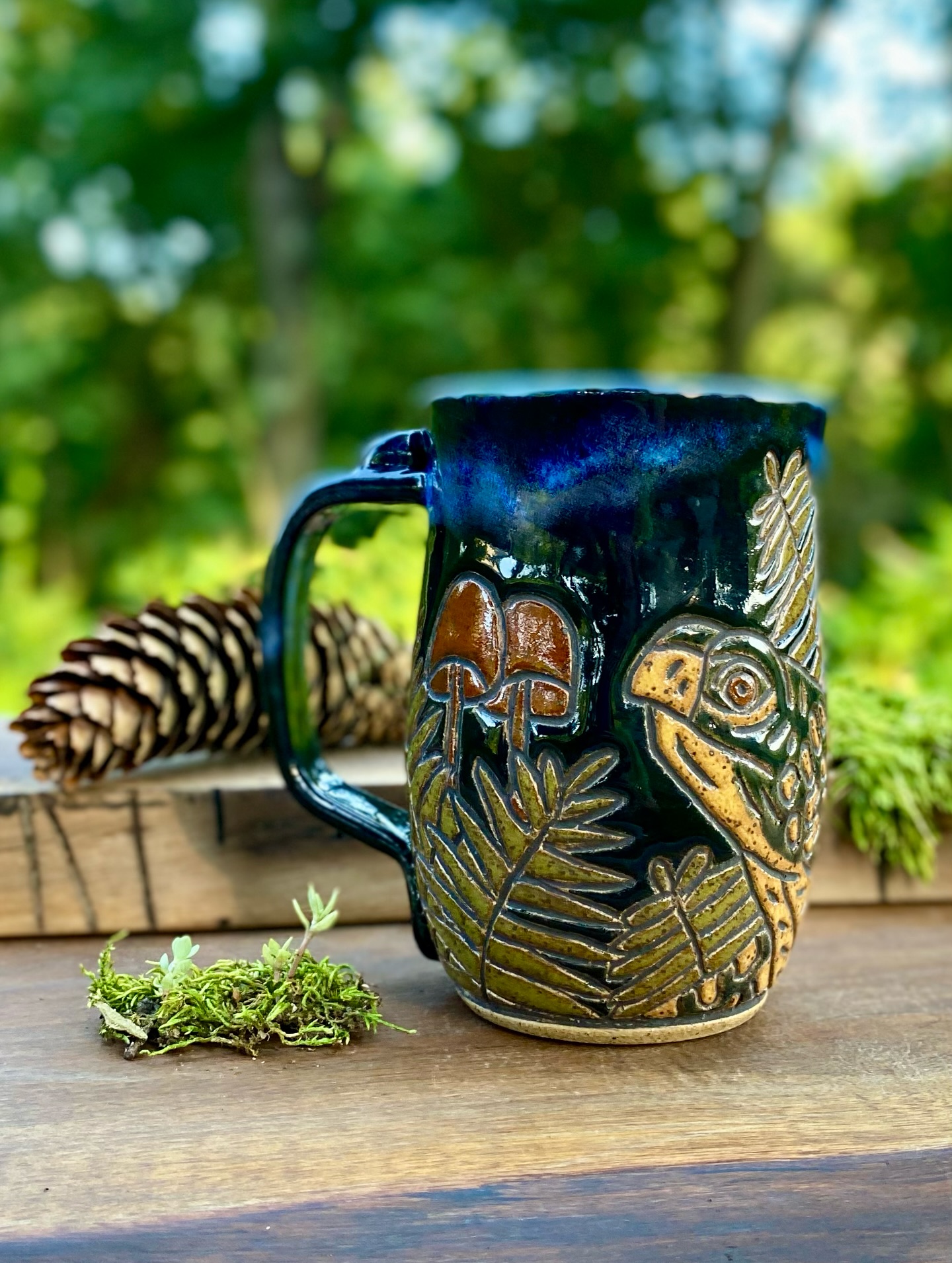 I had some fun carving critters in ferns, which I find to be one of the most magical plants in the forest.
1-3. Box turtle in ferns with little brown mushrooms. 4-5. Fox in ferns on a starry night. 6-8. Raccoon in ferns in a starry evening. 10-12. Snail on moss in ferns.
#potterymugs #mugcollection #mugcollector #stonewaremugs #handmadepots #fernmagic #raccoonmug #snailmug