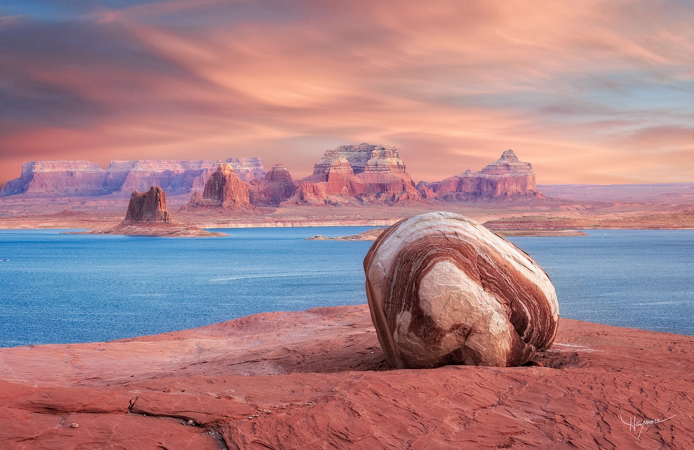 Funny thing about this photo…..I’ve been searching for this particular lone rock for the past five years. My GPS tracks in the area zig zagging all over the place like a toddler trying to connect the dots and missing every one of them, LOL.
Lake Powell is so vast, even with narrowing down the specific area and butte, I had spent many visits and hours wandering around in 104º temps.
When I finally found it, I was ecstatic, beyond belief! I returned to the houseboat and showed the photo to my sister in law and as she took out her phone, that same rock was her wallpaper. My jaw dropped. She had found it years before. Hahaha.
It was a project where I just wanted to find it myself and not have it handed to me by asking someone for GPS coordinates. Often it’s the other things you find along the way that brings joy in the discovery. There are many other photos I’ve taken in this area that I highly enjoy, and would have never discovered or captured them if I hadn’t been searching for so long.