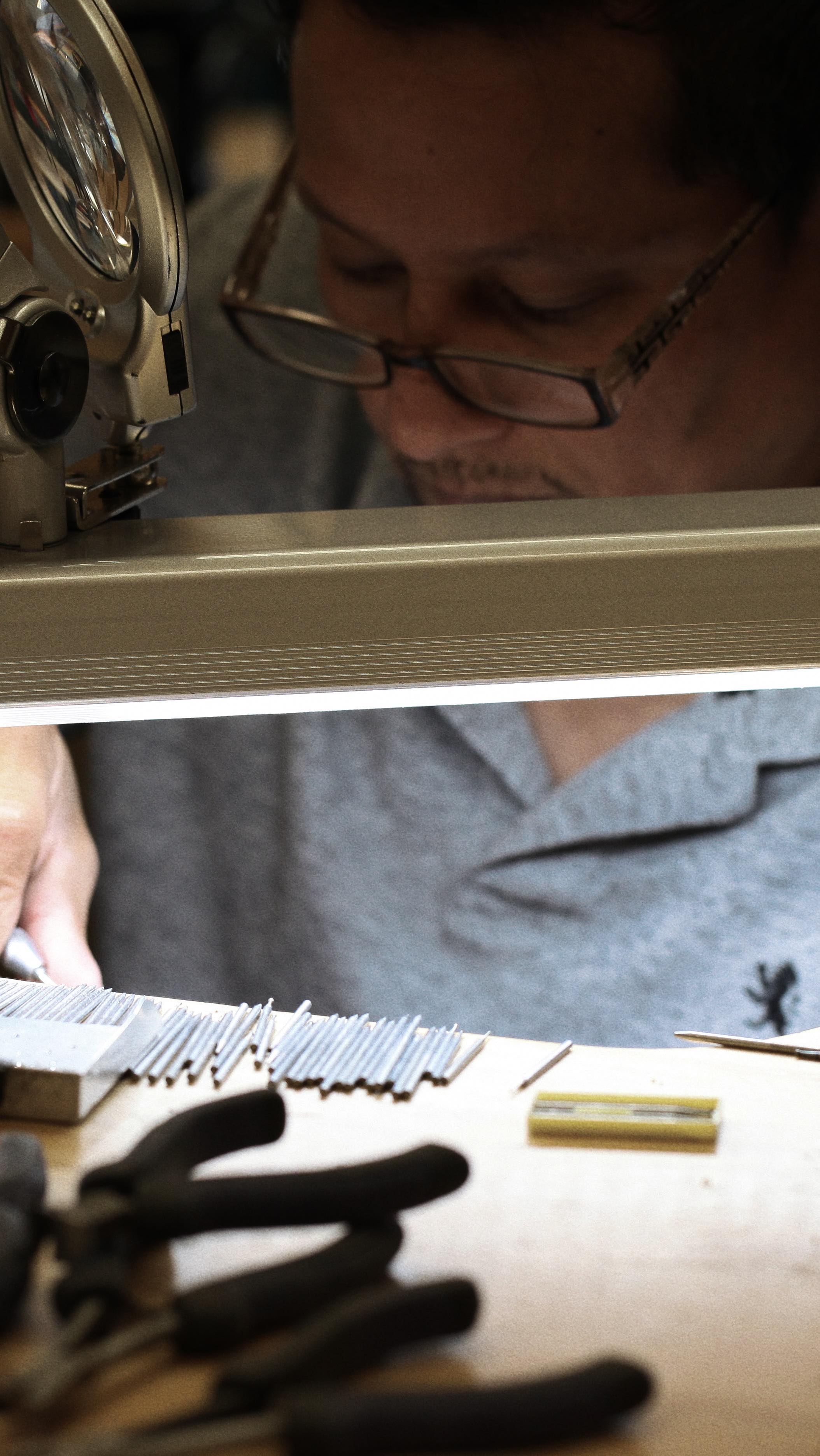 “Another day creating beauty — this time, with a timeless eternity band featuring elegant oval diamonds, each stone meticulously set to perfection.”