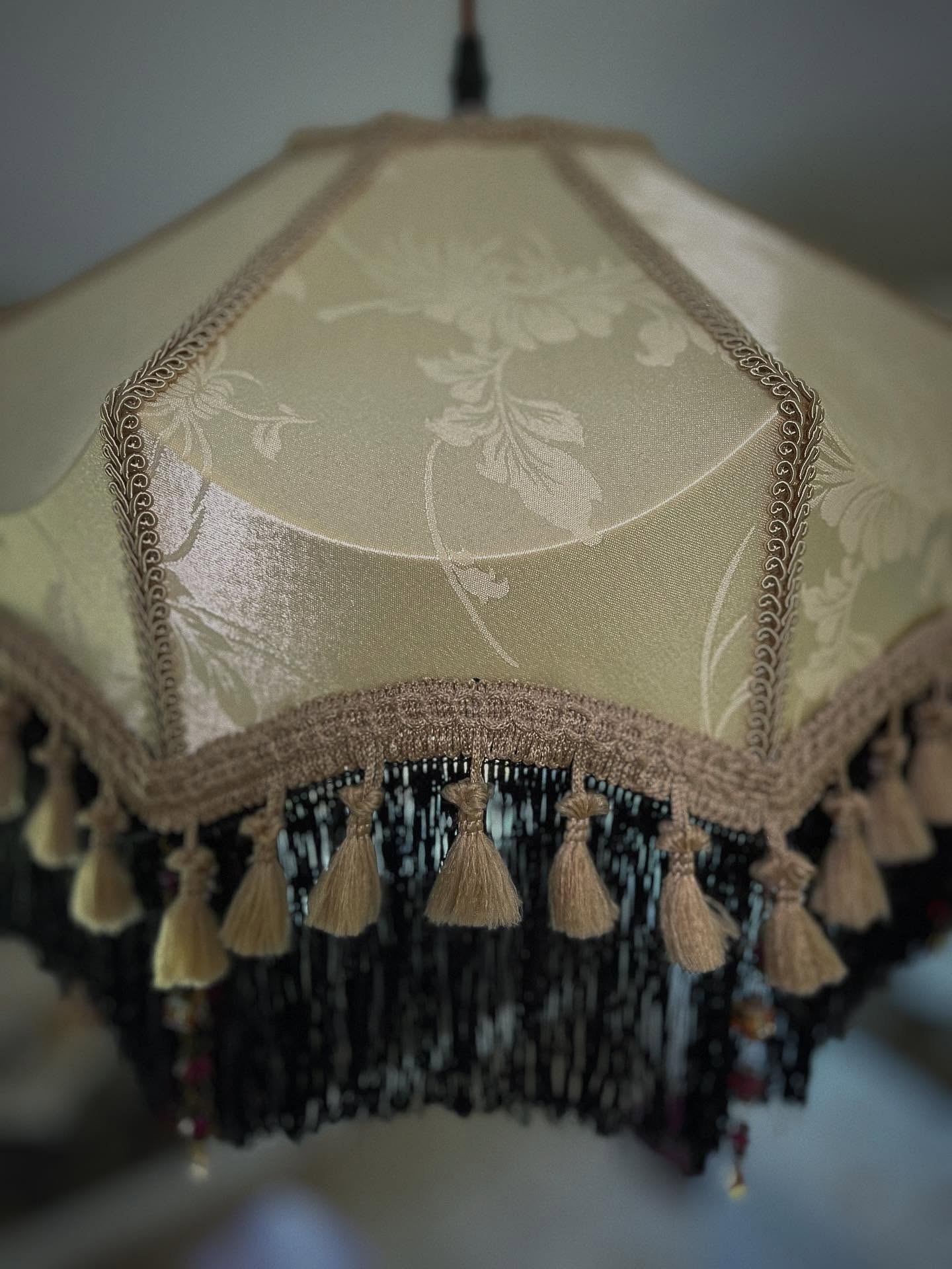 .
Name: Ruby (Meaning - Wealth/Prosperity/Good Health)
Colour: Cream/Black/Gold/Ruby)
Lamp Frame: Double Scalloped 14”
Lamp Style: Pendant
Category: Vintage Glamour
£298.99 - SOLD
Go to www.ritzyroguelampshades.co.uk