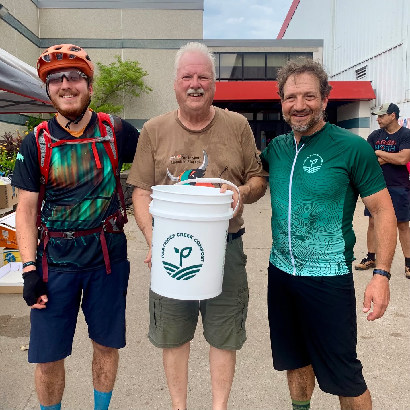 Our very own @trainwithrobw raced @ore2shore this past weekend, and Kurt Kipling from Ishpeming City Council volunteered to collect orange peels out on the course too! Check out this custom jersey from @loyaltees.clothing, we're cheesin and steezin ova hereee. 🚵♂️ 🧀 #mountainbikelife #communitysupport #composting #zerowasteevent #feelgoodlookgood