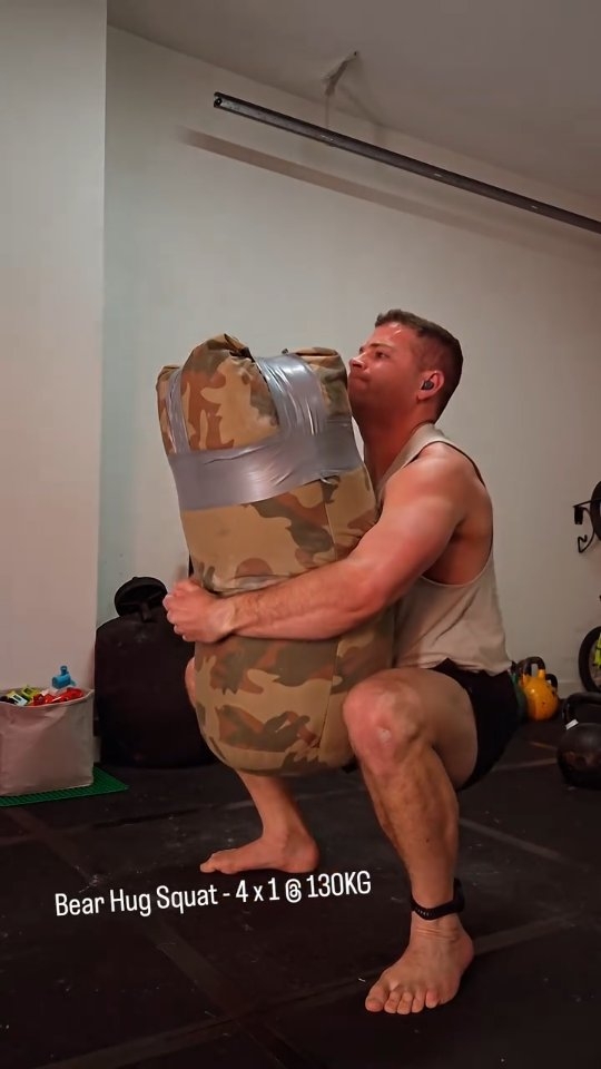 Started with the 130KG bag today. The length is a new challenge getting to the lap. Slowly slowly, it will start to smoothen up. Ill add a set each session until i build to 10. Then start adding reps on that.
Todays session - 12 AUGUST 2025
A. Sandbag High Pulls - 105kg x 3 x 3
B1. Bear Hug Squat - 130kg x 4 x 1
B2. Double Press - dble 40kgs x 10 x 1
C. Band extensions x 50 reps
D. Band curls x 50 reps
#strongfirst #sandbagtraining #strongmantraining #kettlebelltraining