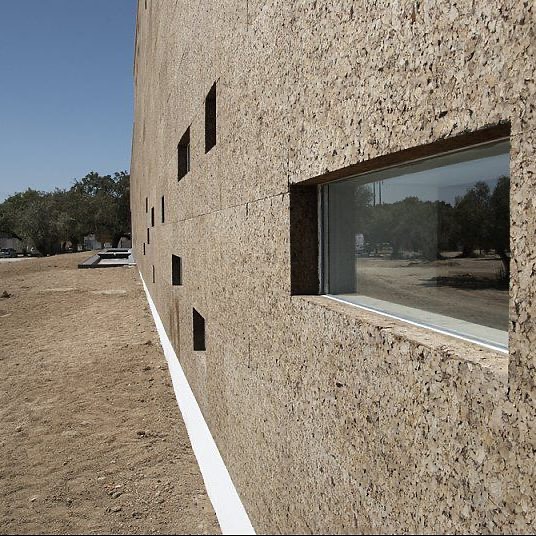 We mostly see cork being used as an interior floor finishes, for wall tiles or furniture. But rarely seen on exterior building facades.
It is a wonderful material to use for external applications as it reduces environmental noise, acts like an insulating skin to provides thermal insulation and is resistant to moisture….aswell as being biodegradable, regenerative, low in embodied C02 with an aesthetically attractive quality.
Studio Bark @studiobark create robust, low-cost, zero-waste architectural projects demonstrating the possibilities of cork architecture. Their cork bricks made from waste cork from the wine industry.
Ecork Hotel by @josecarloscruz used MD Façade Cork Board from SecilVit @secilpt supplied by @mike_wye
@surmanweston ‘s London based Cork Study features a light toned formed from the re-harvestable bark of cork oak trees.
#archictecturalmaterials #cork #corkmaterial #corkarchitecture #corkinsulation #materialinnovation #naturalmaterials #facades #renewablematerials