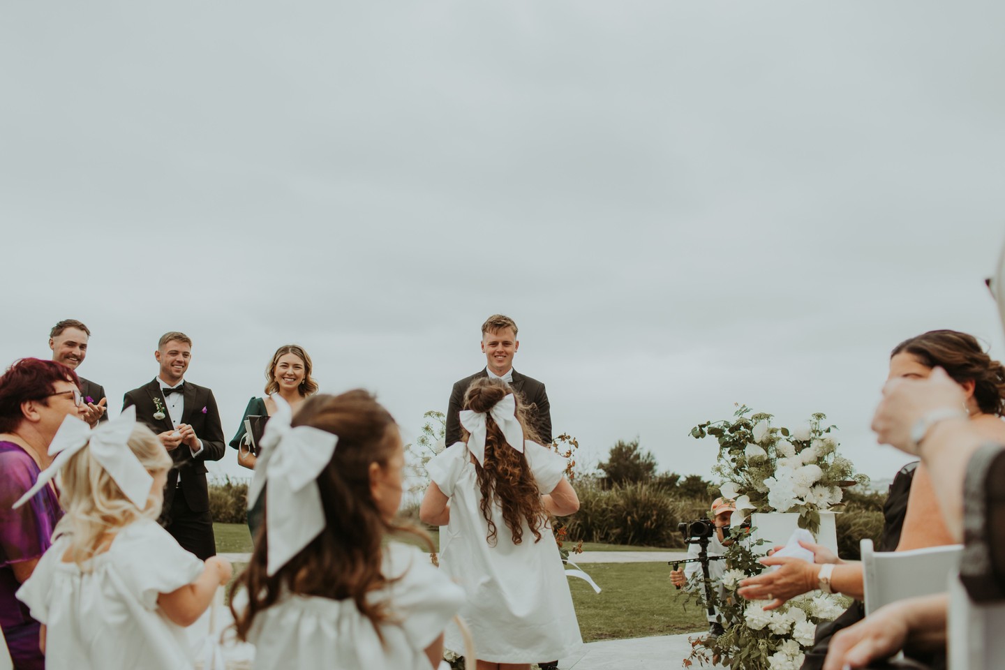 Thinking back to that amazing November day flying up to Austinmer for Kianah & Bailey's wedding. It was a whirlwind trip, but every moment was worth it to celebrate such a beautiful couple in a stunning location. With 200 guests and the biggest wedding party I've ever seen, the air was just electric. K&B's wedding was a perfect storm of love, laughter, and good vibes, and the start of one truly spectacular happily ever after.
🌷 @bloomsby_elodie
♥️ @headlandsaustinmerbeach
🎷 @stanislove_sax
🎥 @i.shot.jerry
#wedding #throwback #love #theysaidido #happilyhitched #weddingparty #beachwedding #celebrant #sydneycelebrant #marriagcelebrant #melbournecelebrant #weddingphotography